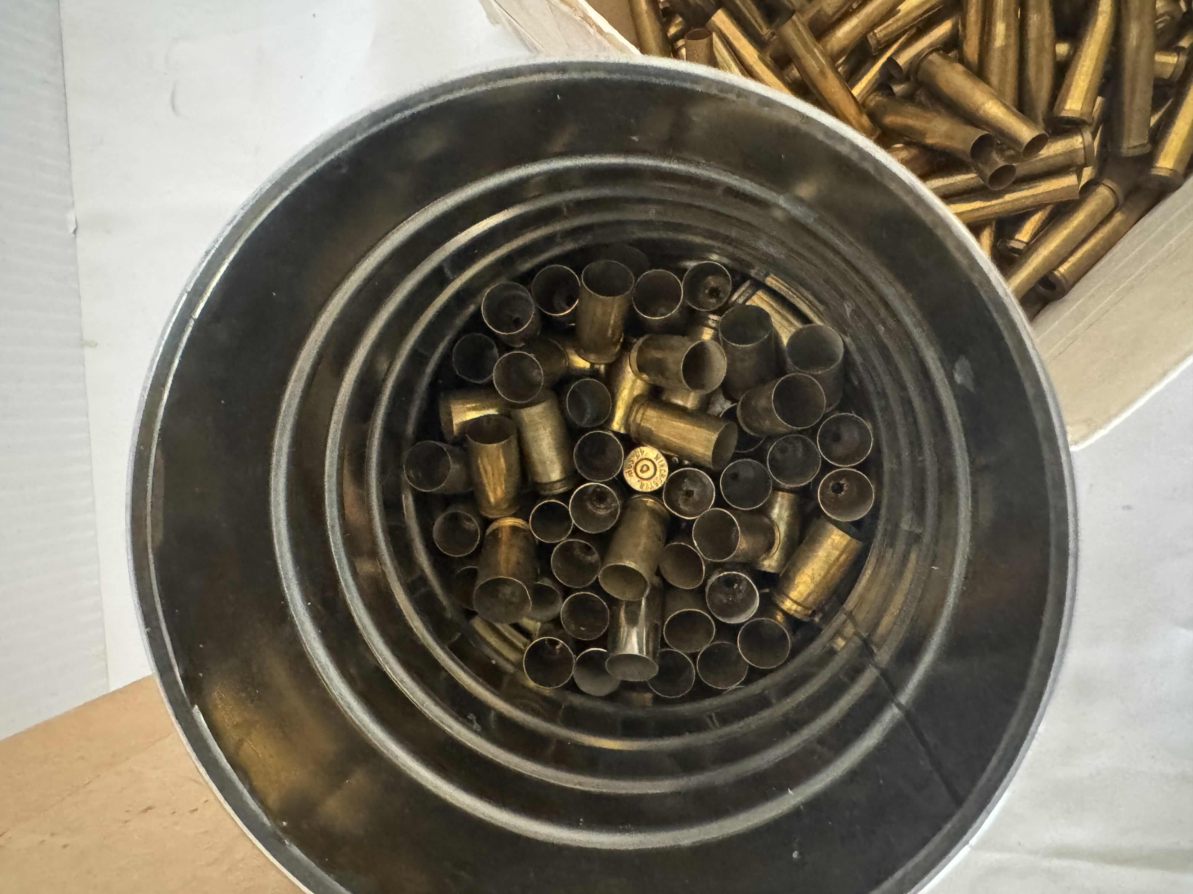 Photo 1 of ASSORTED SHELL CASINGS-AMMUNITION ACCESSORIES FOR FIREARMS.