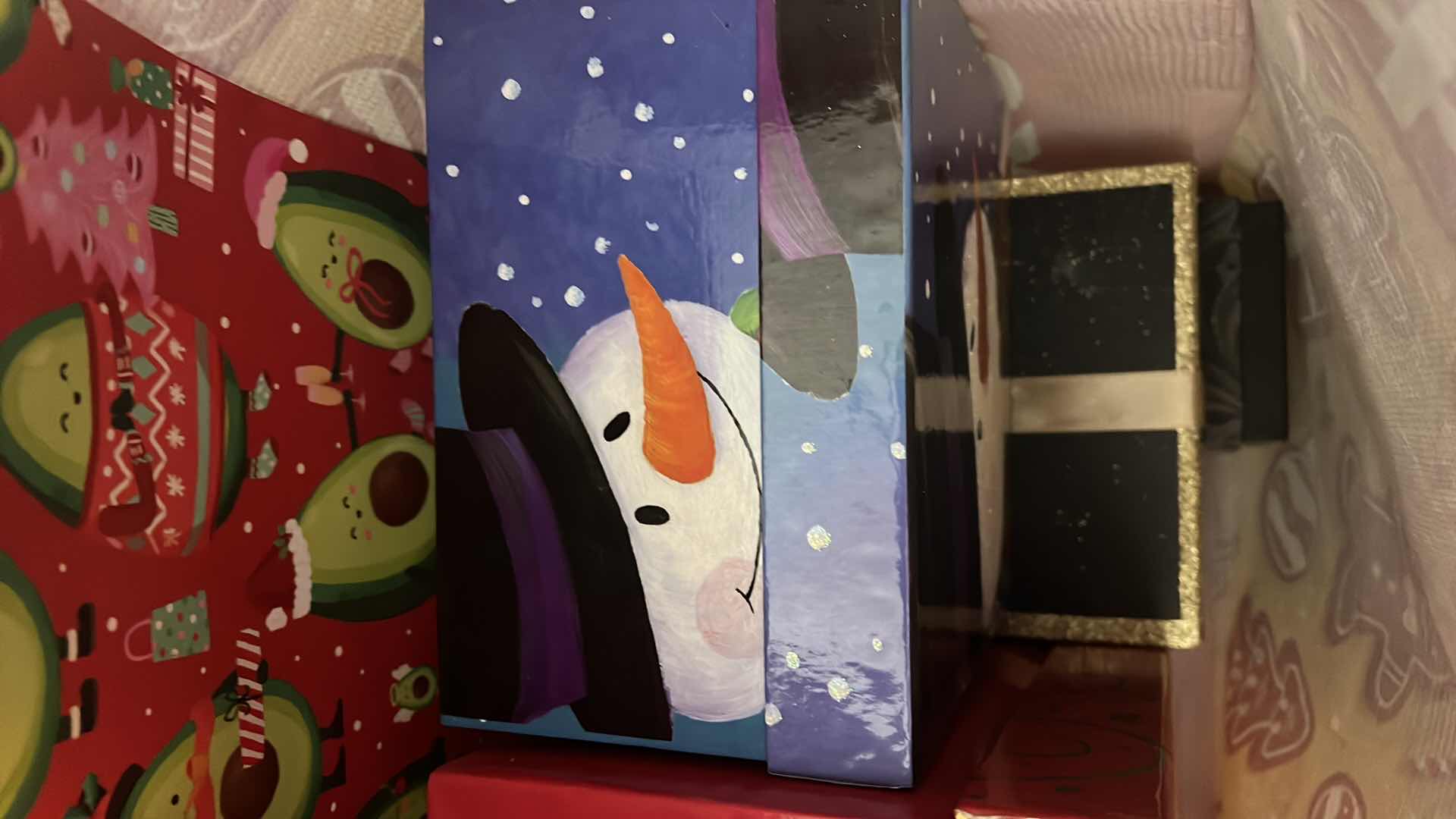 Photo 3 of CONTENTS OF BAG-CHRISTMAS GIFT BAGS AND BOXES.