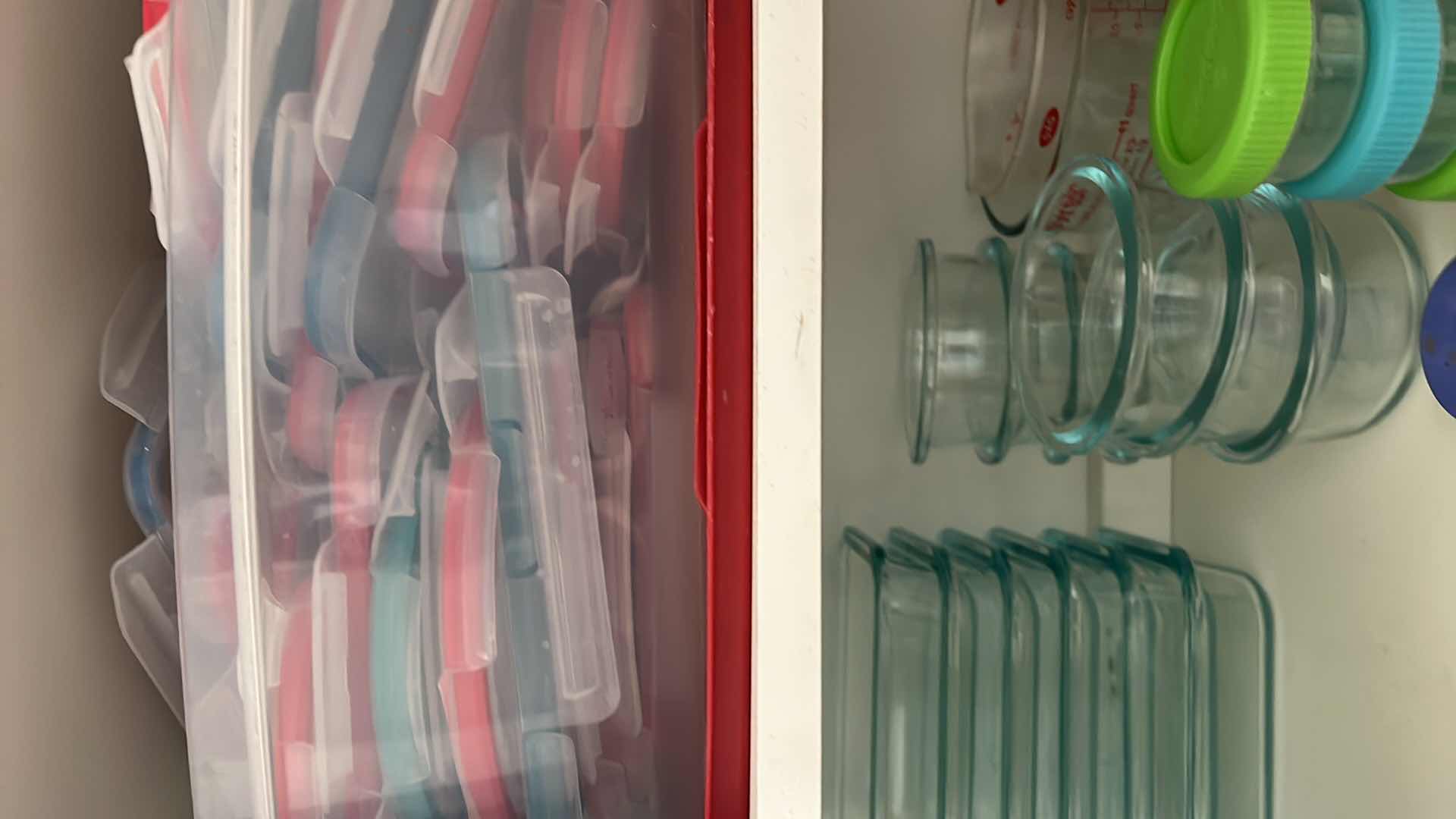 Photo 2 of CONTENTS OF CABINET. GLASS PYREX STORAGE CONTAINERS WITH SNAP ON LIDS