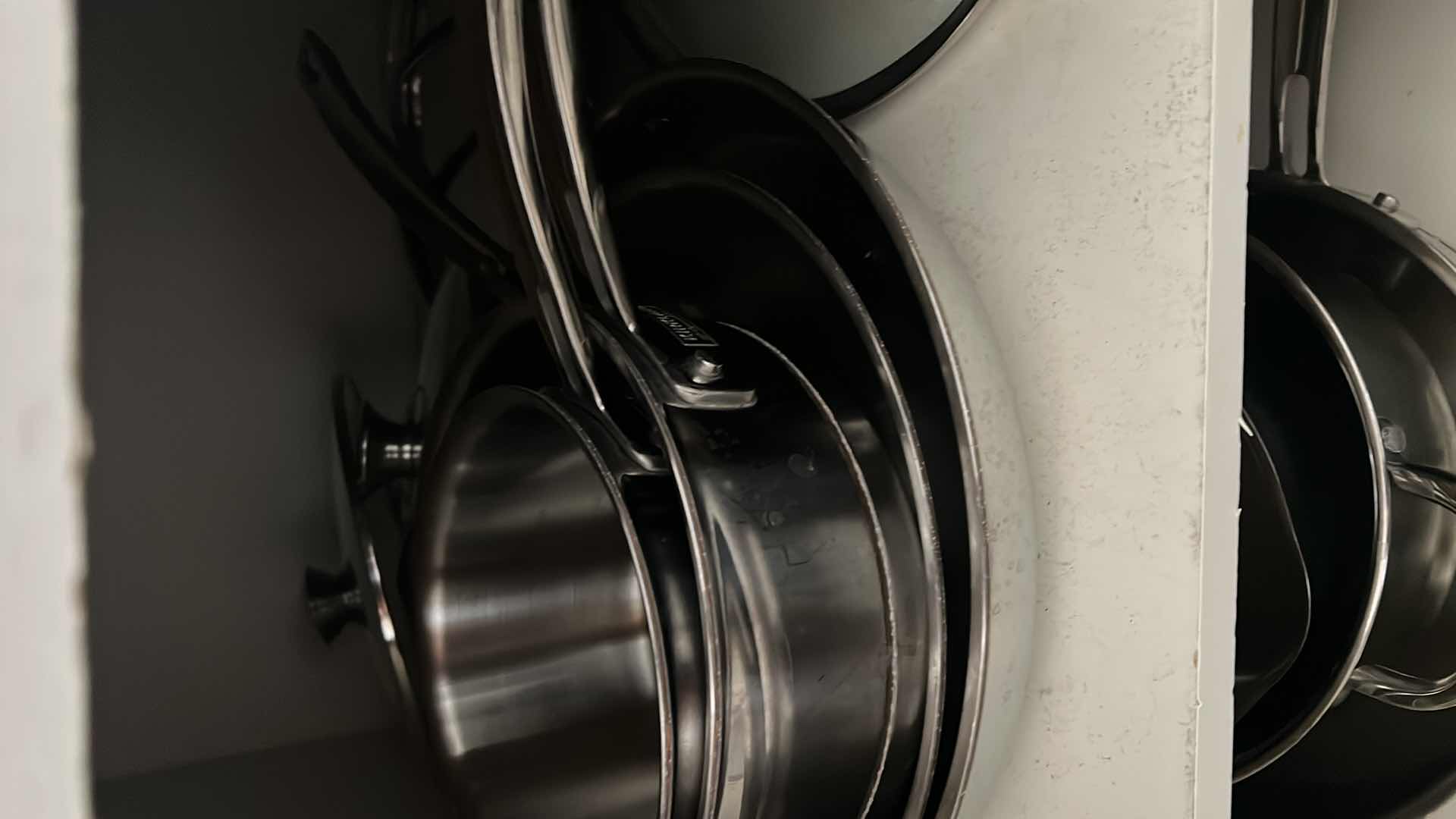 Photo 2 of CONTENTS OF CABINET (LEFT SIDE ONLY) KIRKLAND POTS AND PANS