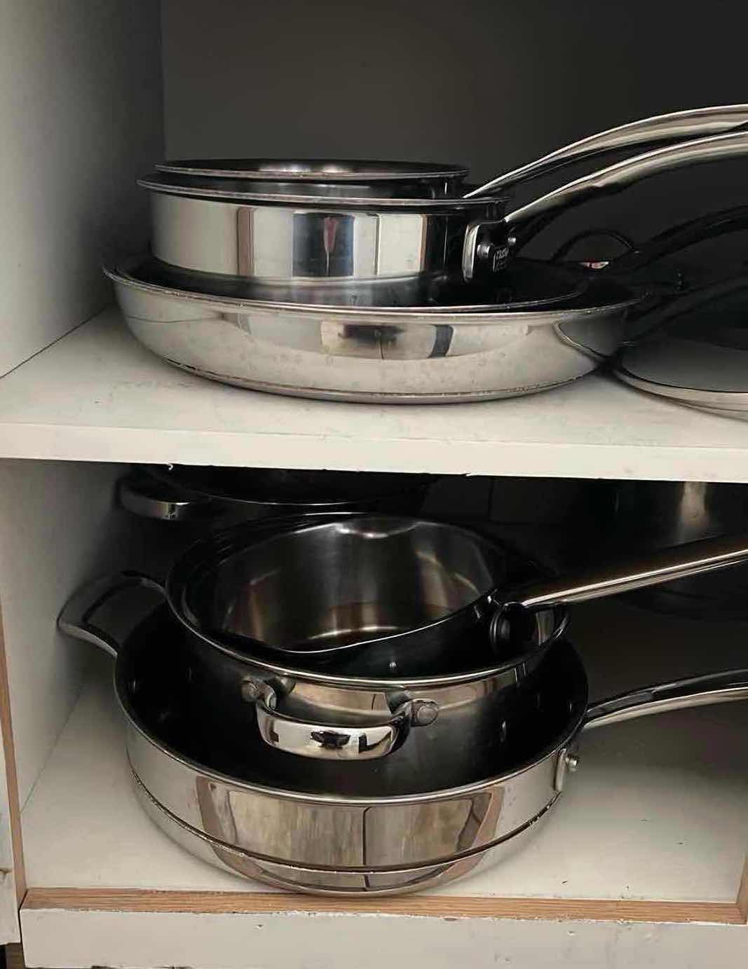 Photo 1 of CONTENTS OF CABINET (LEFT SIDE ONLY) KIRKLAND POTS AND PANS