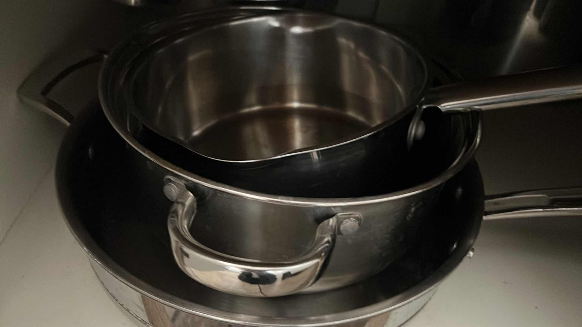 Photo 3 of CONTENTS OF CABINET (LEFT SIDE ONLY) KIRKLAND POTS AND PANS