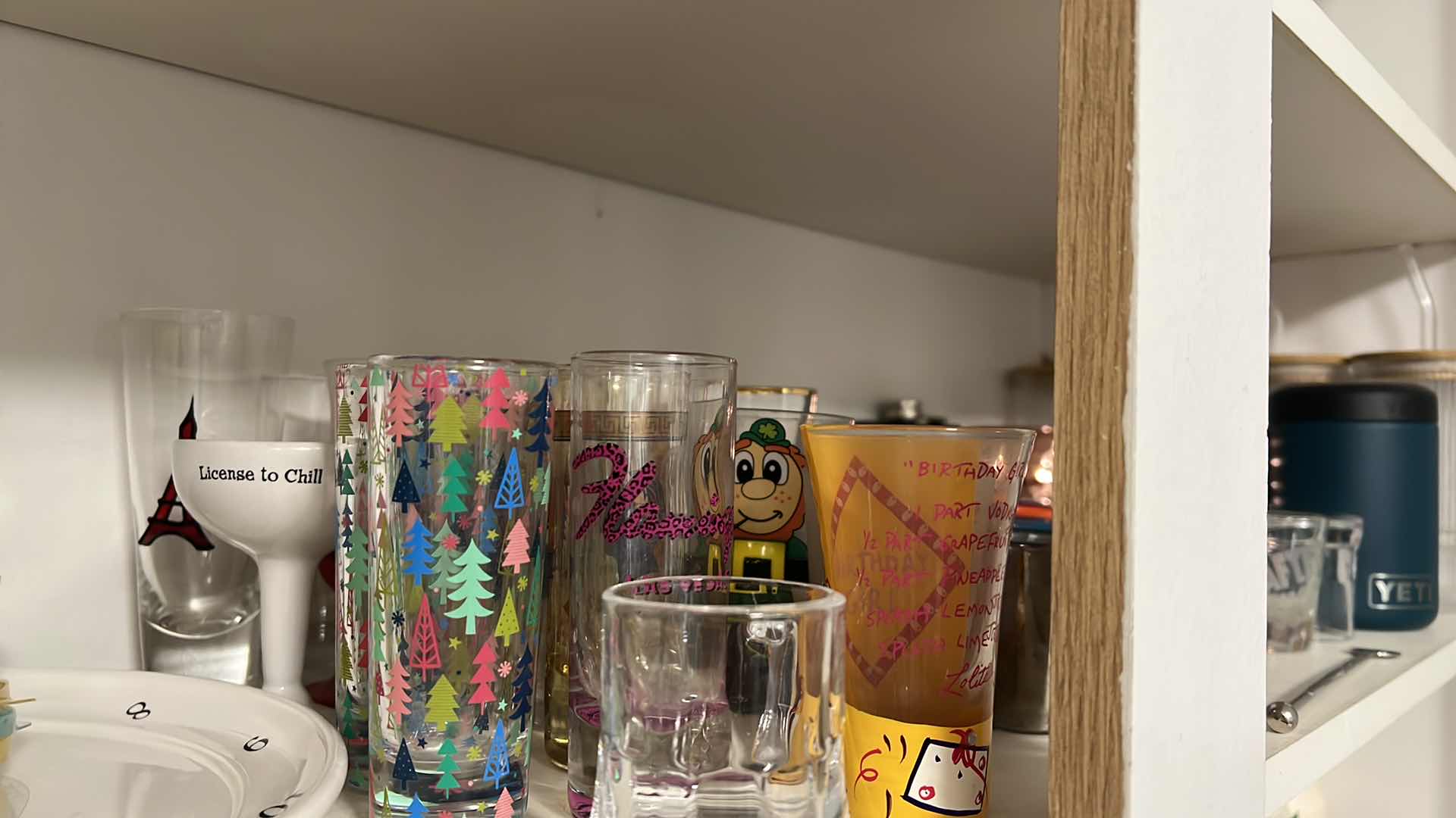 Photo 1 of CONTENTS OF SHELF. SHOT GLASSES