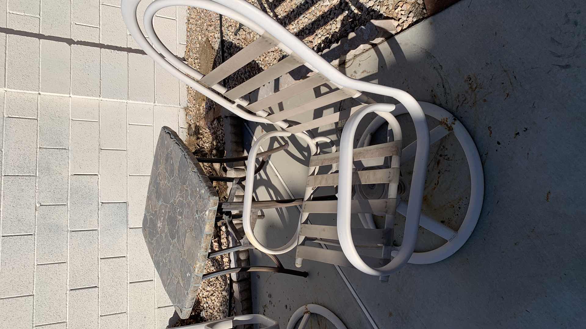 Photo 1 of 2-PATIO CHAIRS AND A STONE TOP TABLE