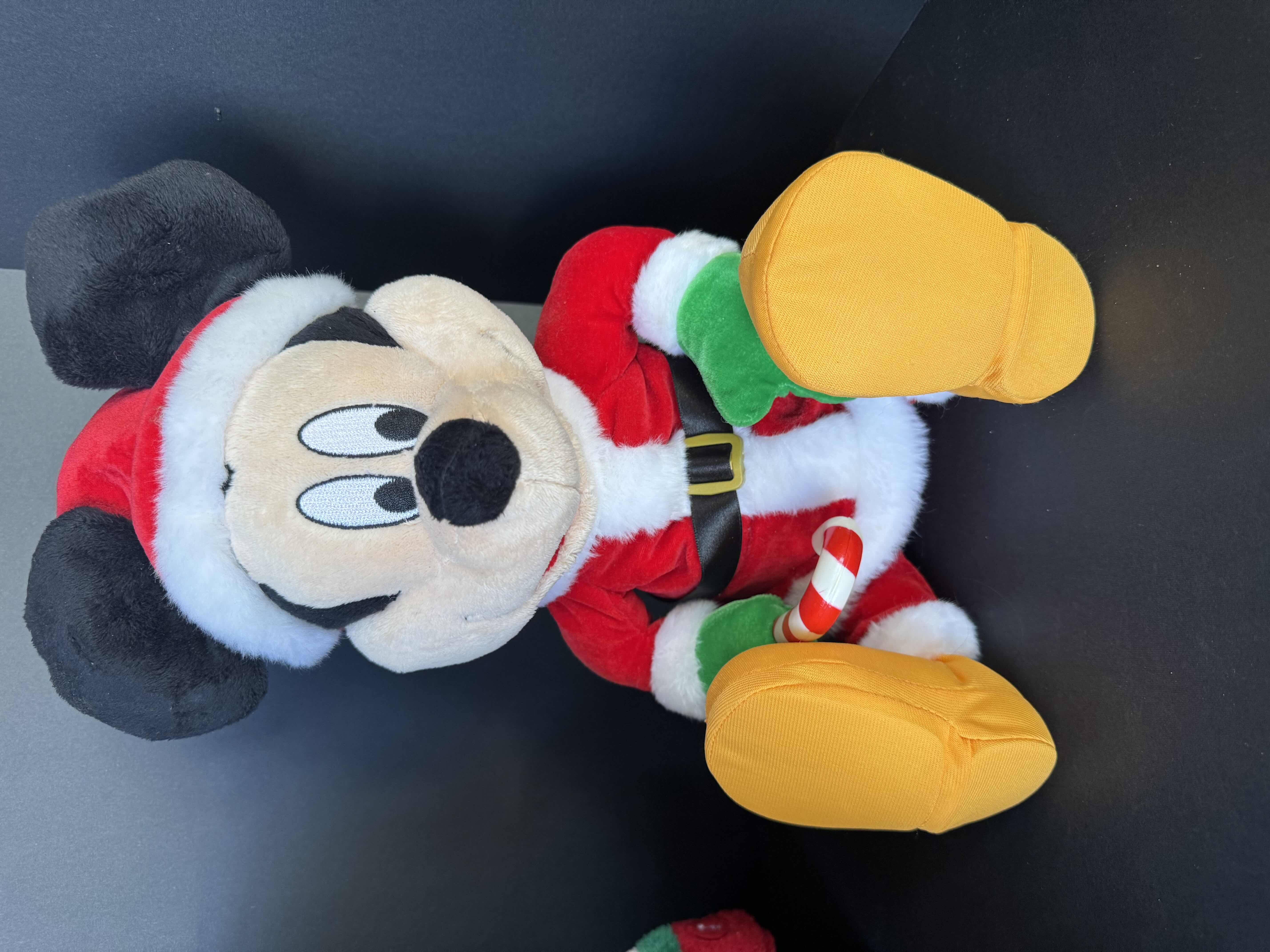 Photo 1 of ASSORTED HOLIDAY PLUSHIES-DISNEY, AND PEANUTS. CHRISTMAS DECOR.