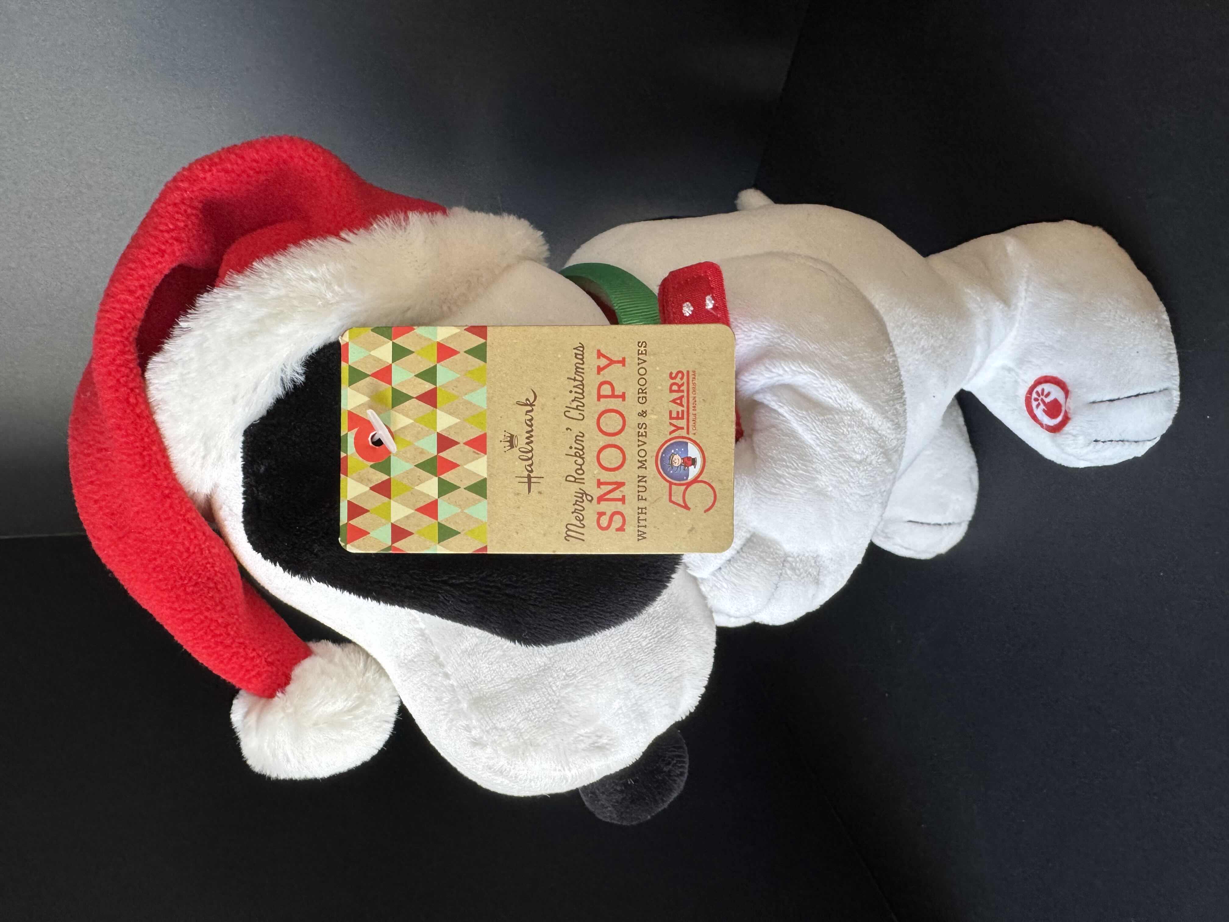 Photo 1 of ASSORTED HOLIDAY PLUSHIES-DISNEY, AND PEANUTS. CHRISTMAS DECOR.