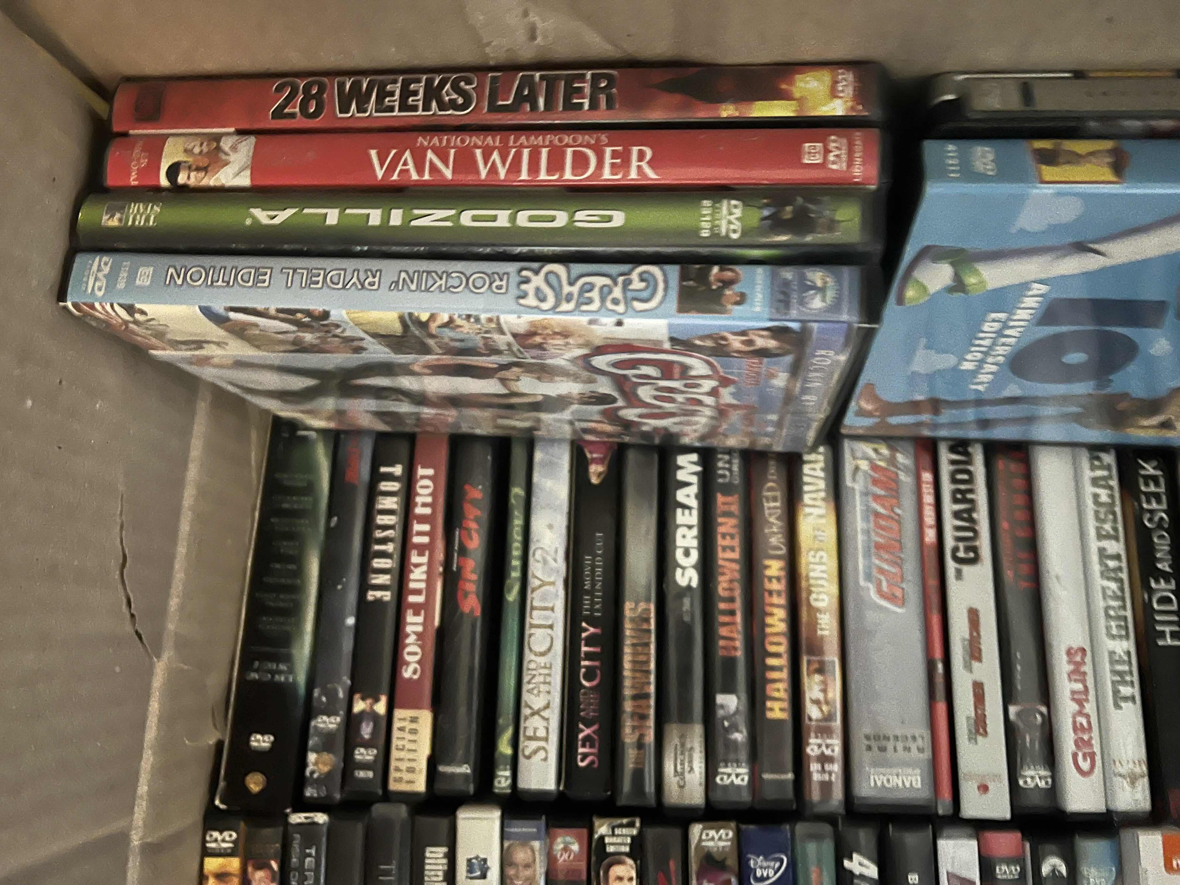 Photo 4 of CONTENTS OF BOX. DVDS