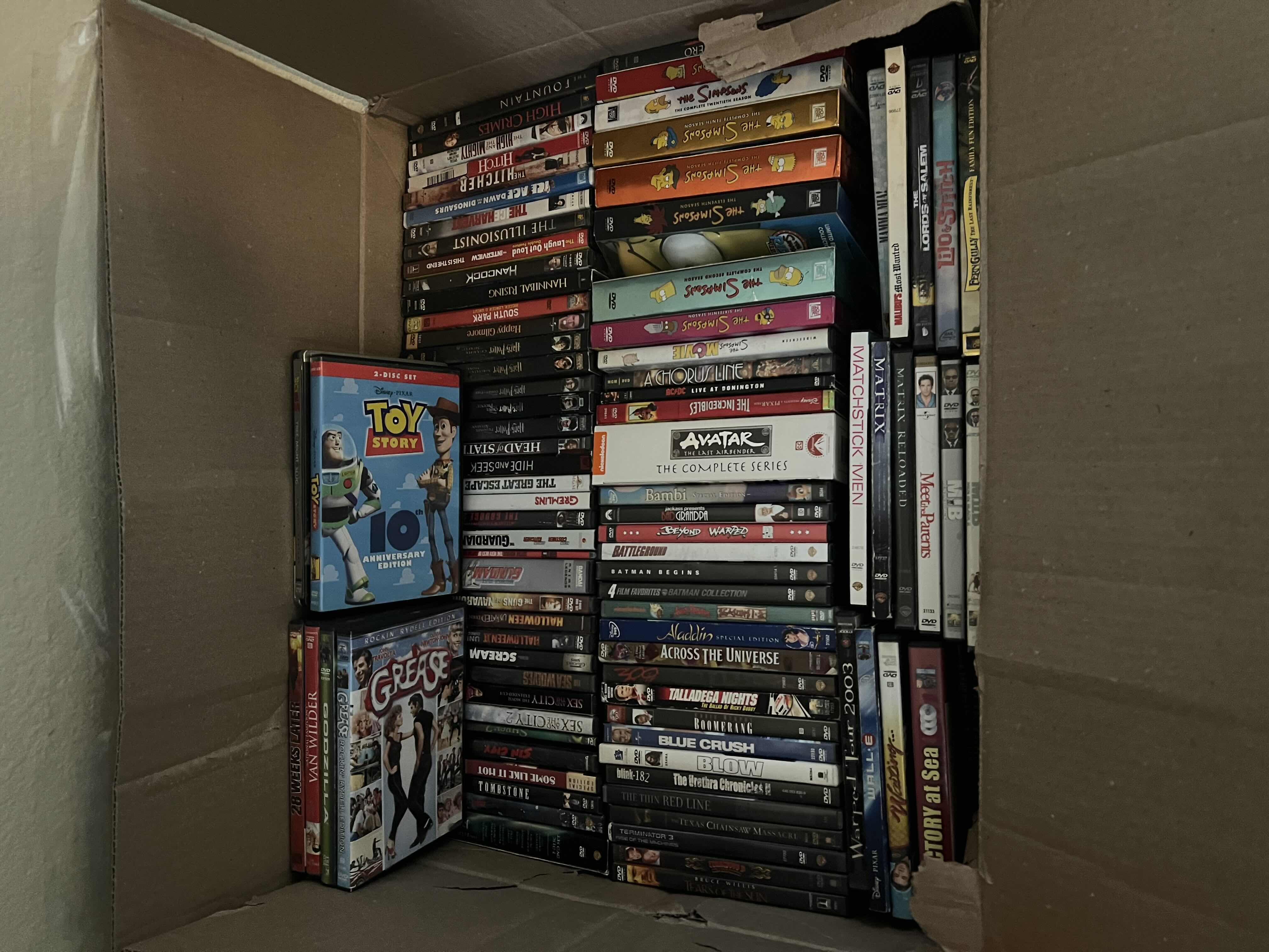 Photo 3 of CONTENTS OF BOX. DVDS