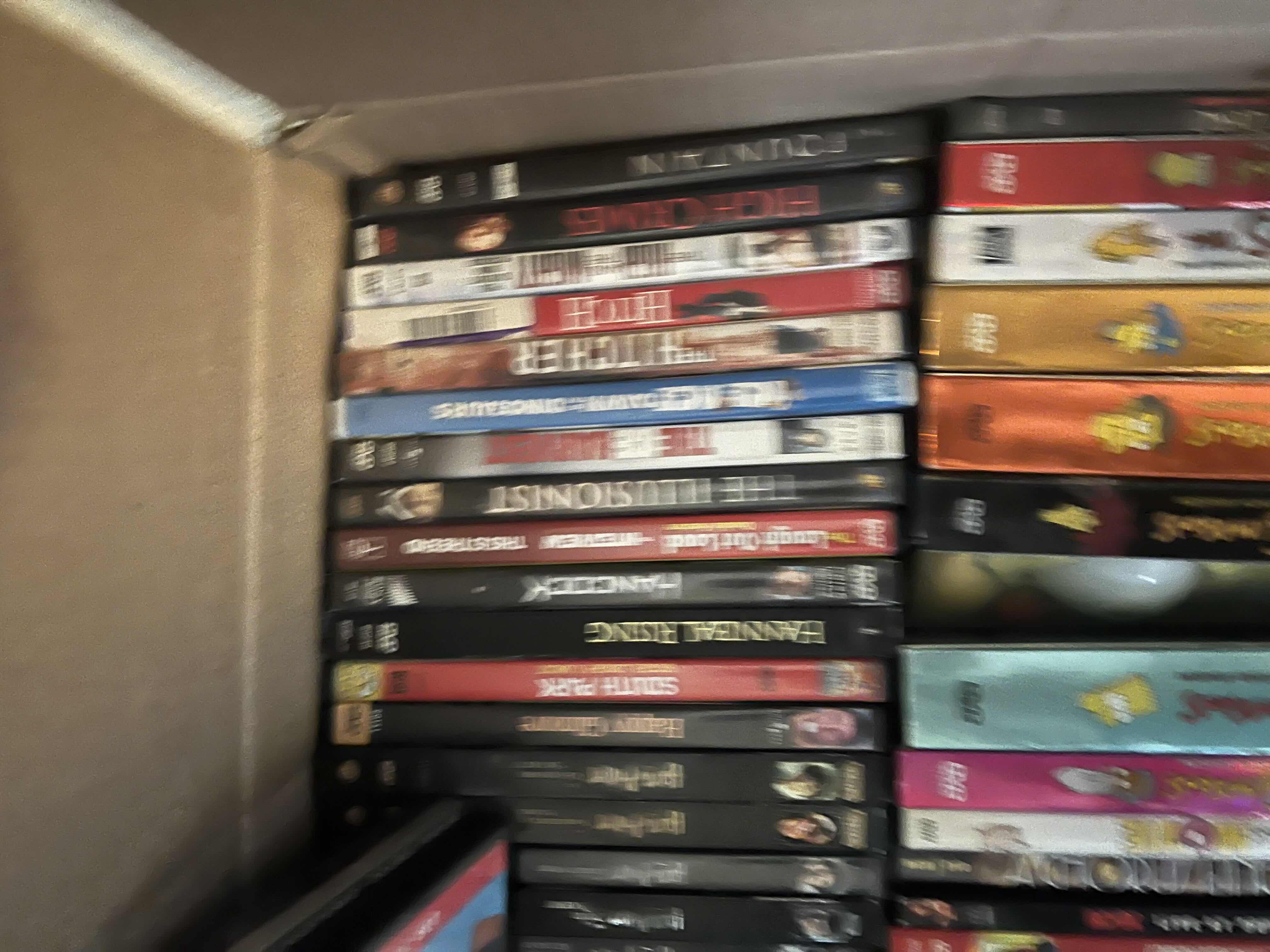 Photo 2 of CONTENTS OF BOX. DVDS