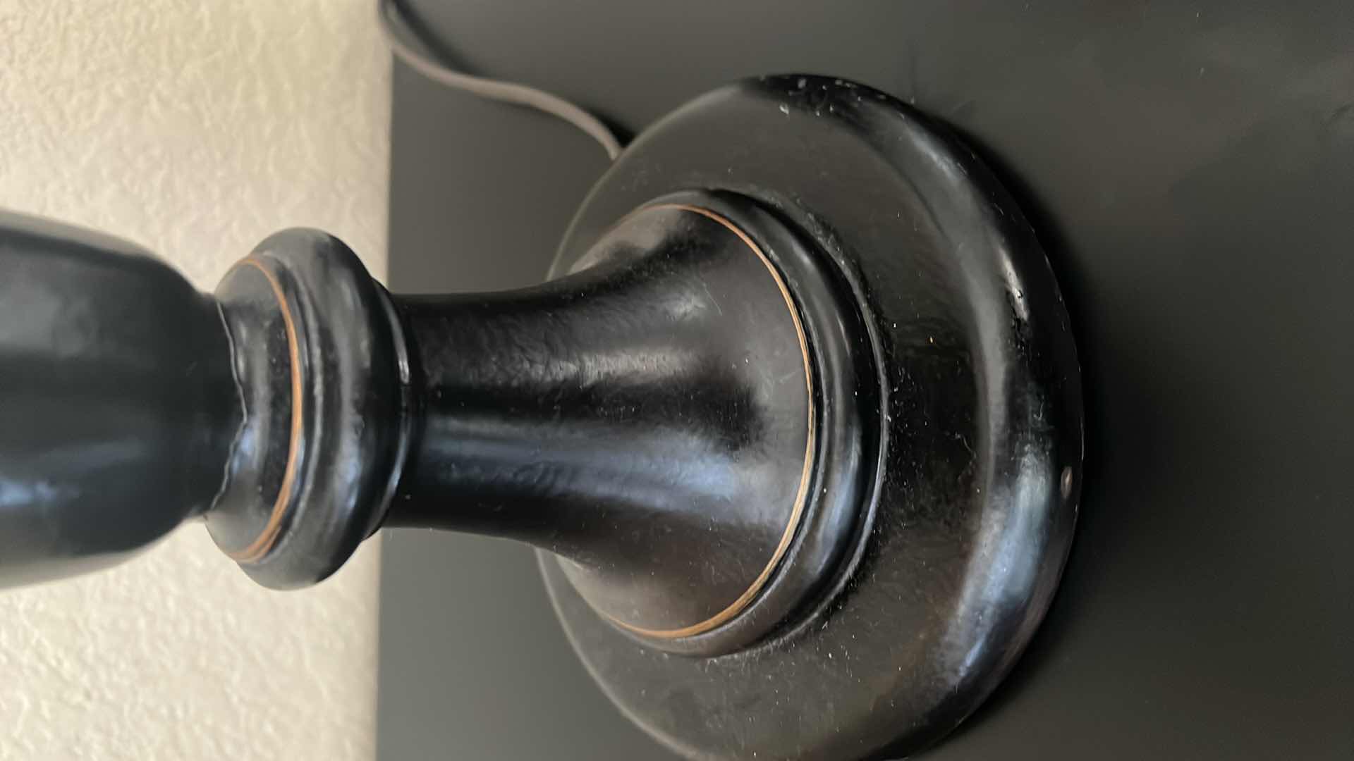 Photo 1 of BEDSIDE LAMP. BLACK WITH LIGHT SHADE. 1 0F 2 SOLD SEPARATELY 30”H