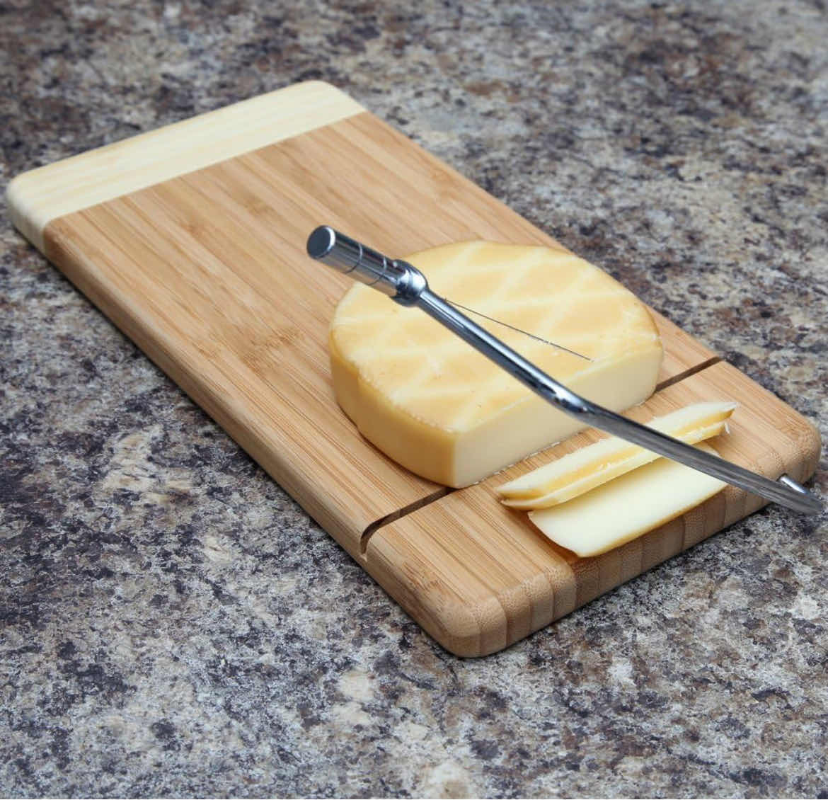 Photo 1 of BAMBOO CHEESE CUTTING BOARD WITH STAINLESS STEEL WIRE CHEESE SLICER, THE ULTIMATE TWO-IN-ONE KITCHENWARE APPLIANCE WITH LITTLE TO NO MESS