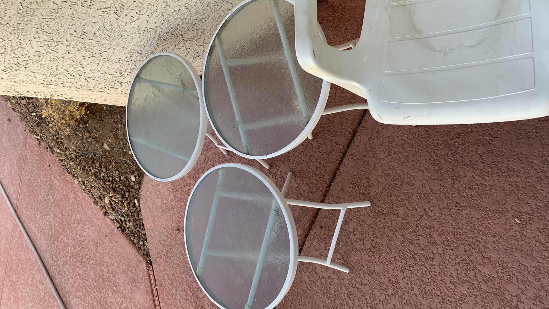 Photo 2 of 3-GLASS TOP PATIO TABLES AND A PLASTIC CHAIR