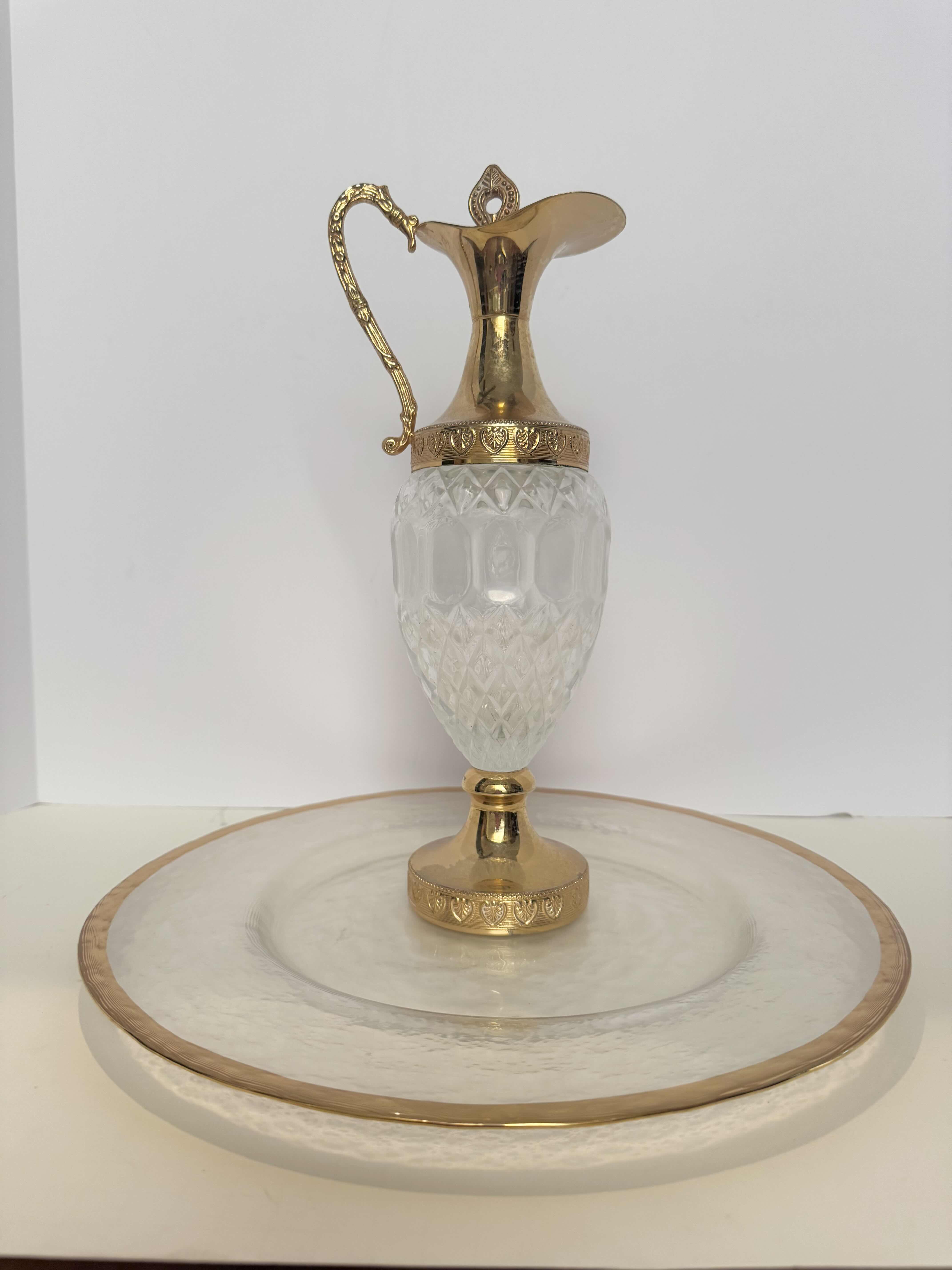 Photo 1 of GLASS PLATE WITH GOLD RIM 13”W,
VINTAGE DECANTER GOLD TONES 13”H