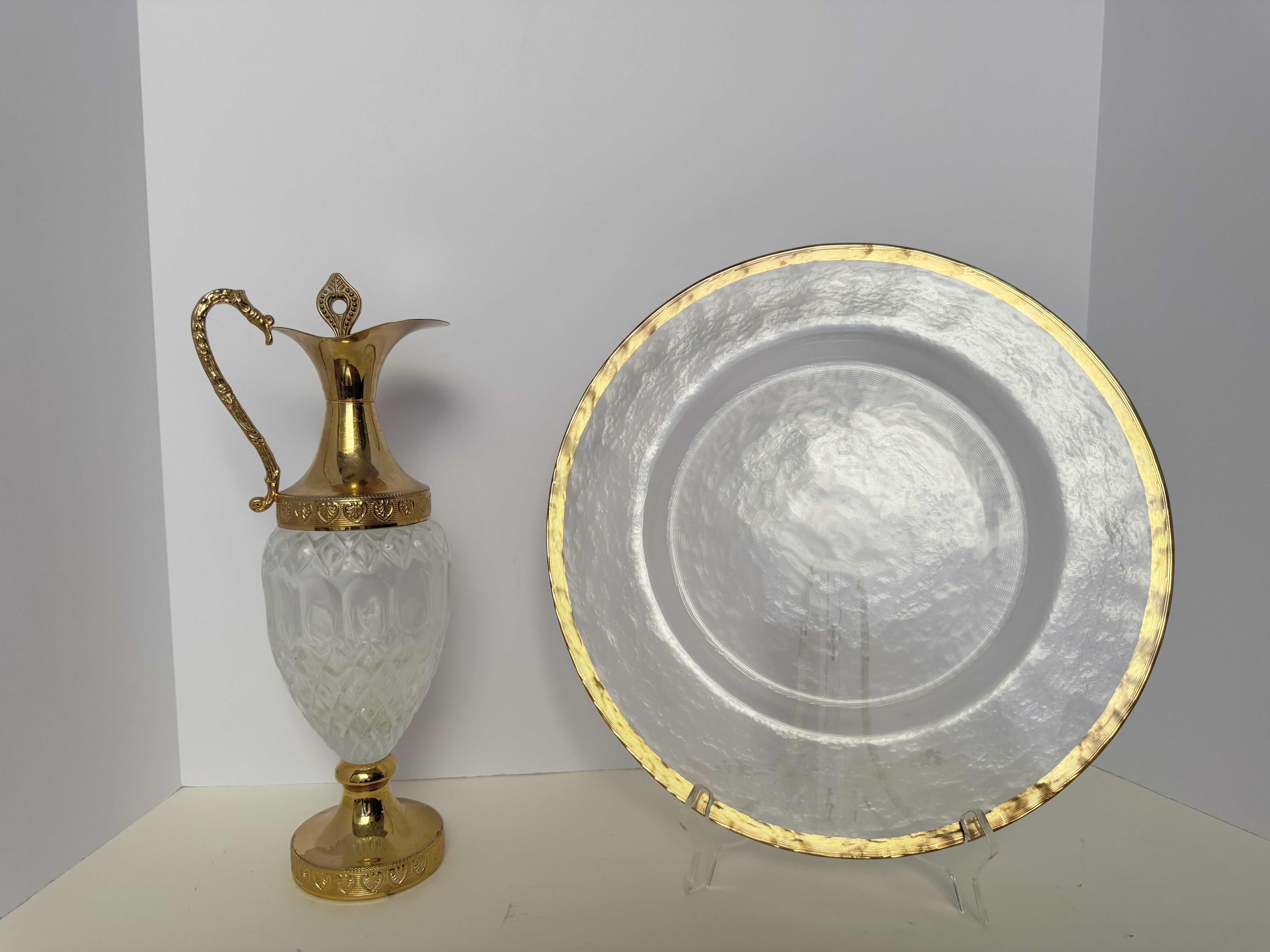 Photo 1 of GLASS PLATE WITH GOLD RIM 13”W,
VINTAGE DECANTER GOLD TONES 13”H