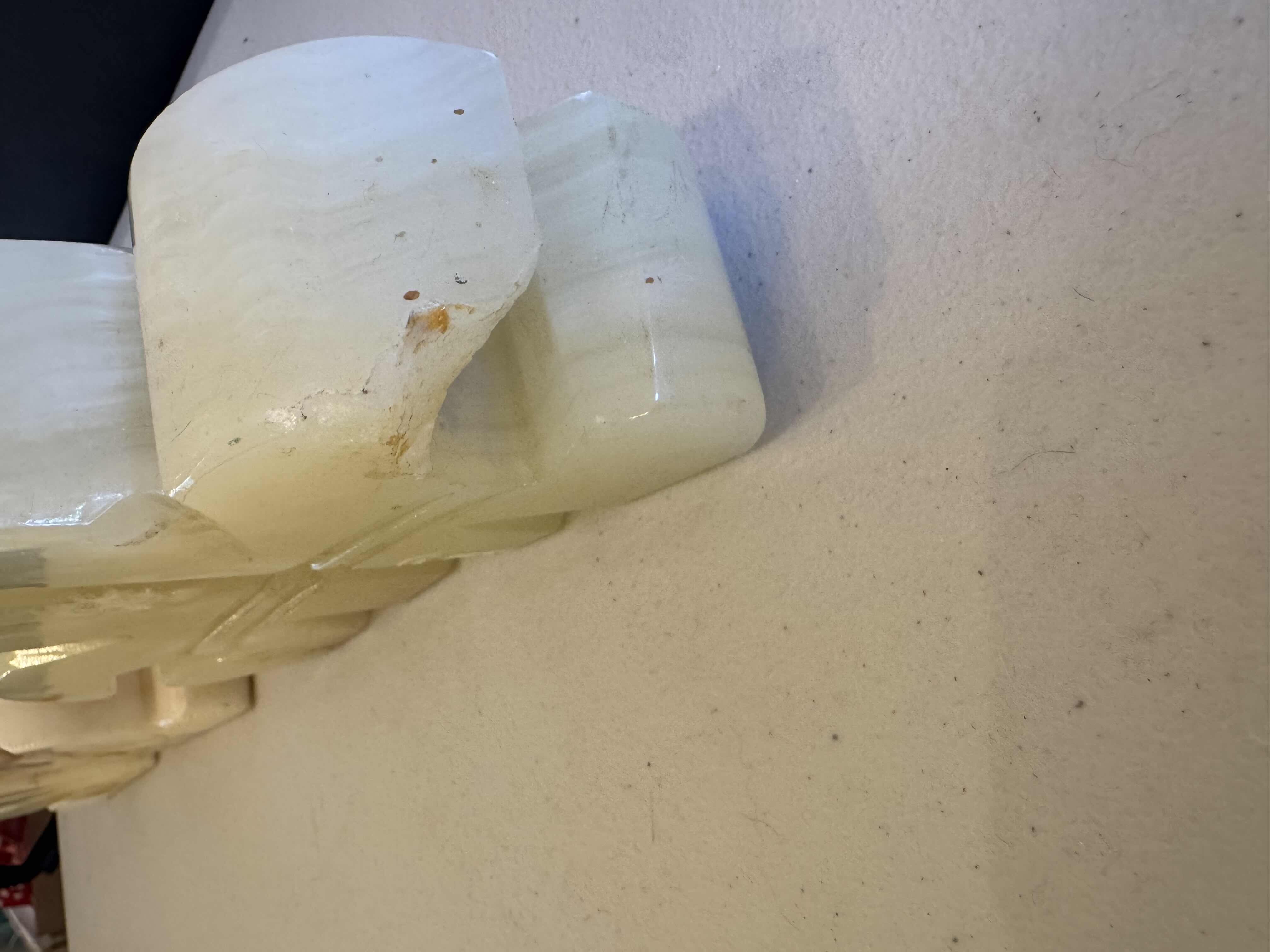 Photo 1 of 2 SETS OF STONE BOOKENDS. ONE IS FLEUR DU LIS.