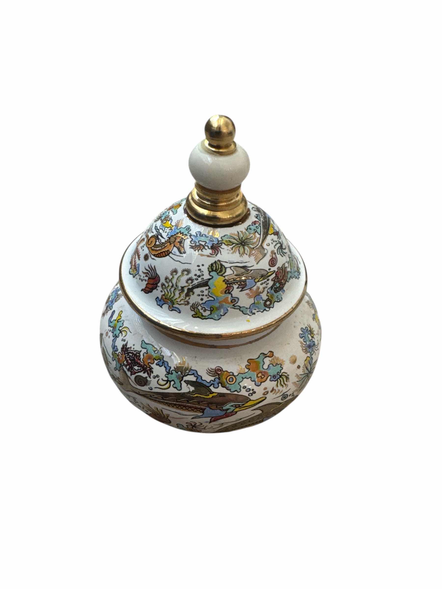 Photo 1 of 50

VINTAGE VENUS SERIE PERFUME BOTTLE HAND MADE