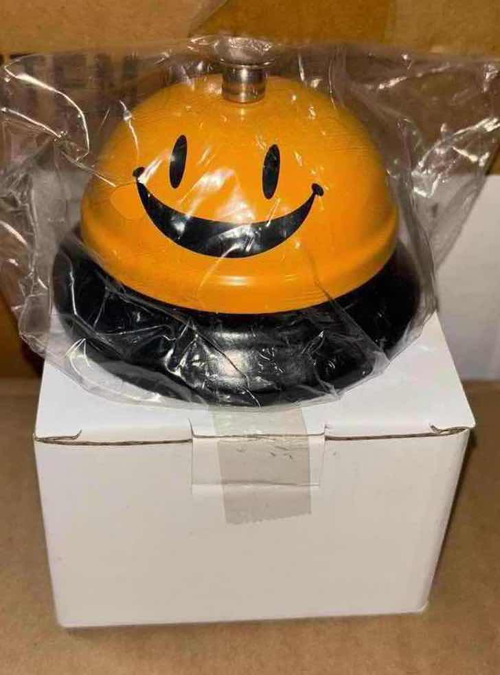 Photo 1 of NEW CASE SMILING COUNTER CALL/SERVICE BELL, ORANGE (60 PCS PER CASE)