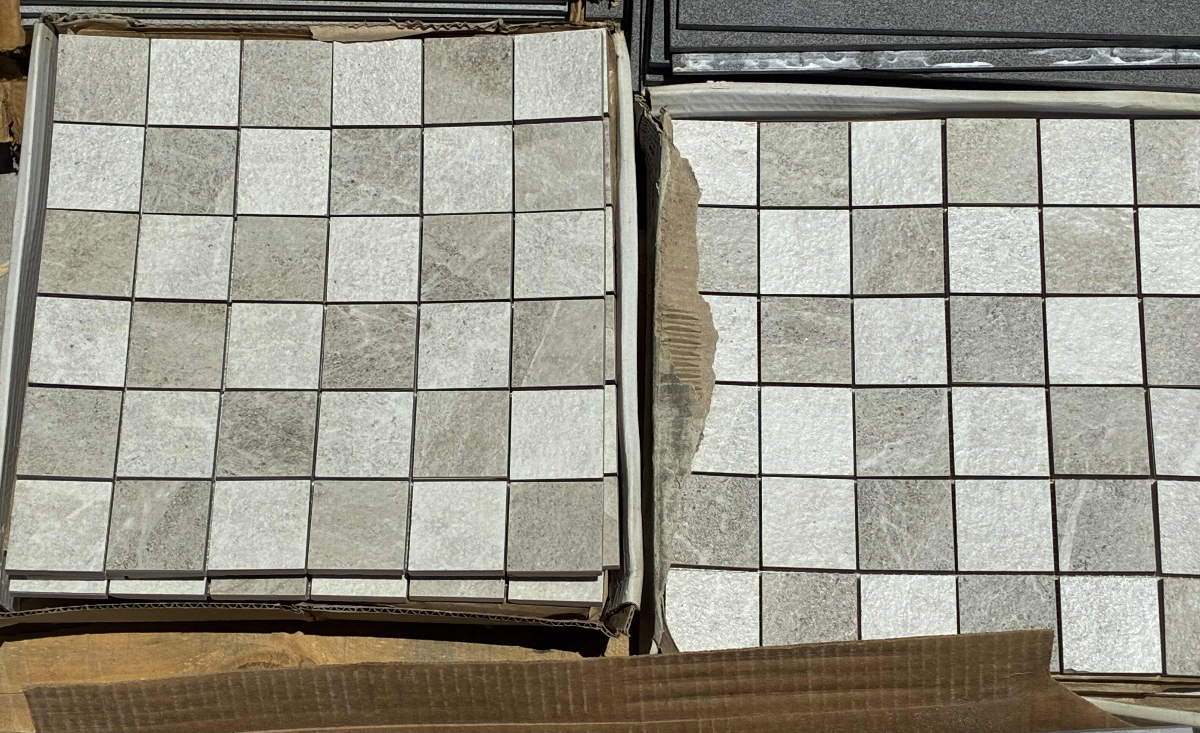 Photo 1 of MIXED STONE FINISH TILE PALLET-SQUARE TILE & MOSAIC TILE W FLOOR BASE TILE (APPROX 7 CASES TOTAL) READ NOTES