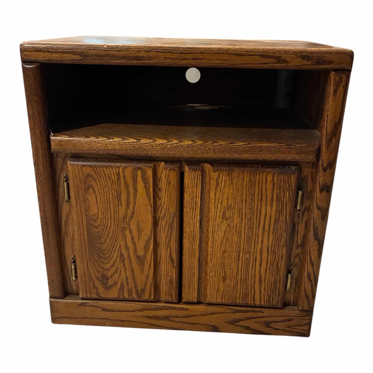 View 1 of OAK WOOD 2 DOOR ROLLING TV CABINET 24“ X 17“ H26“