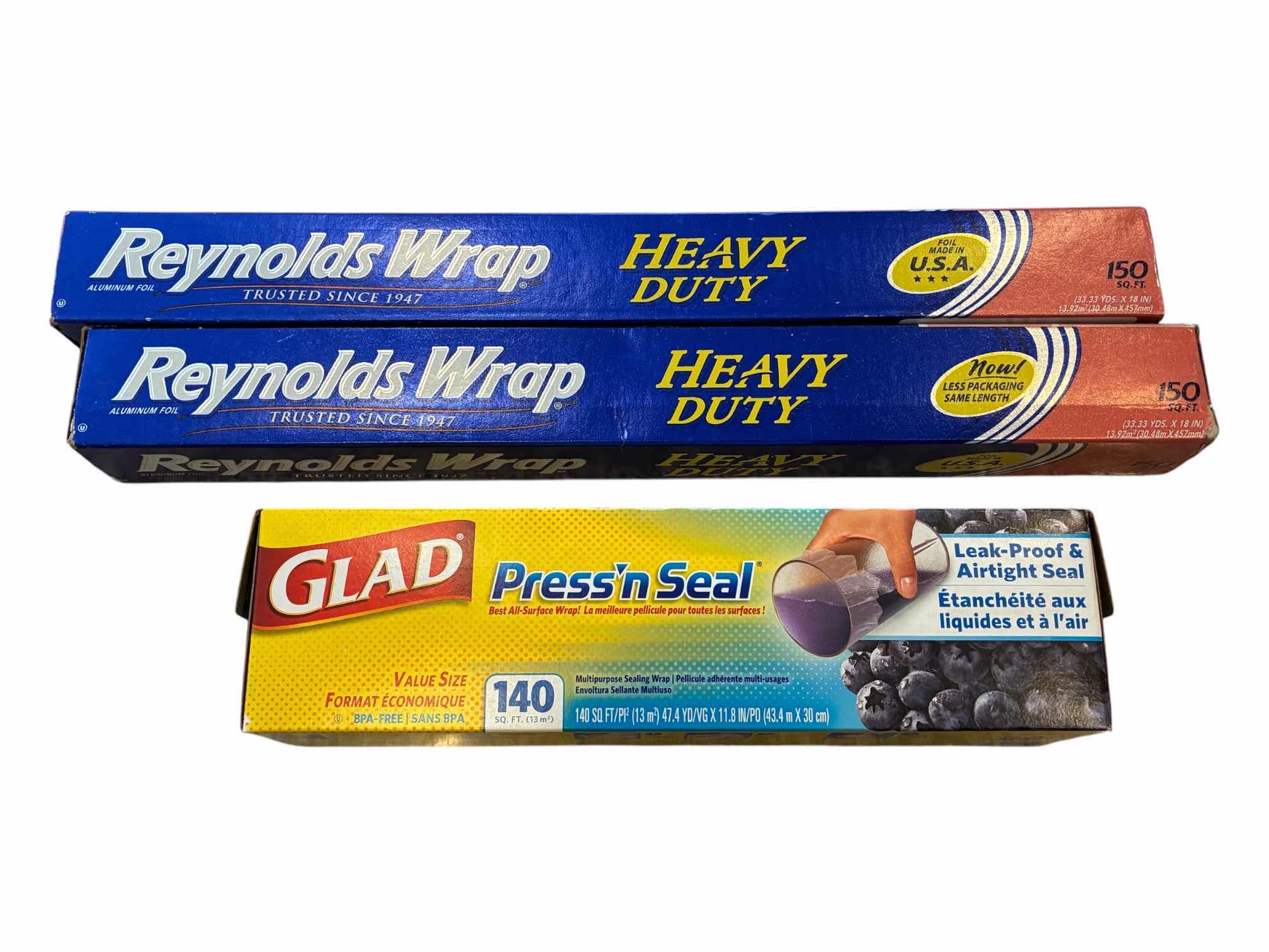 Photo 1 of NEW REYNOLDS WRAP HEAVY DUTY 150SQFT ALUMINUM FOIL (2) & NEW GLAD PRESS AND SEAL 140SQFT PLASTIC WRAP