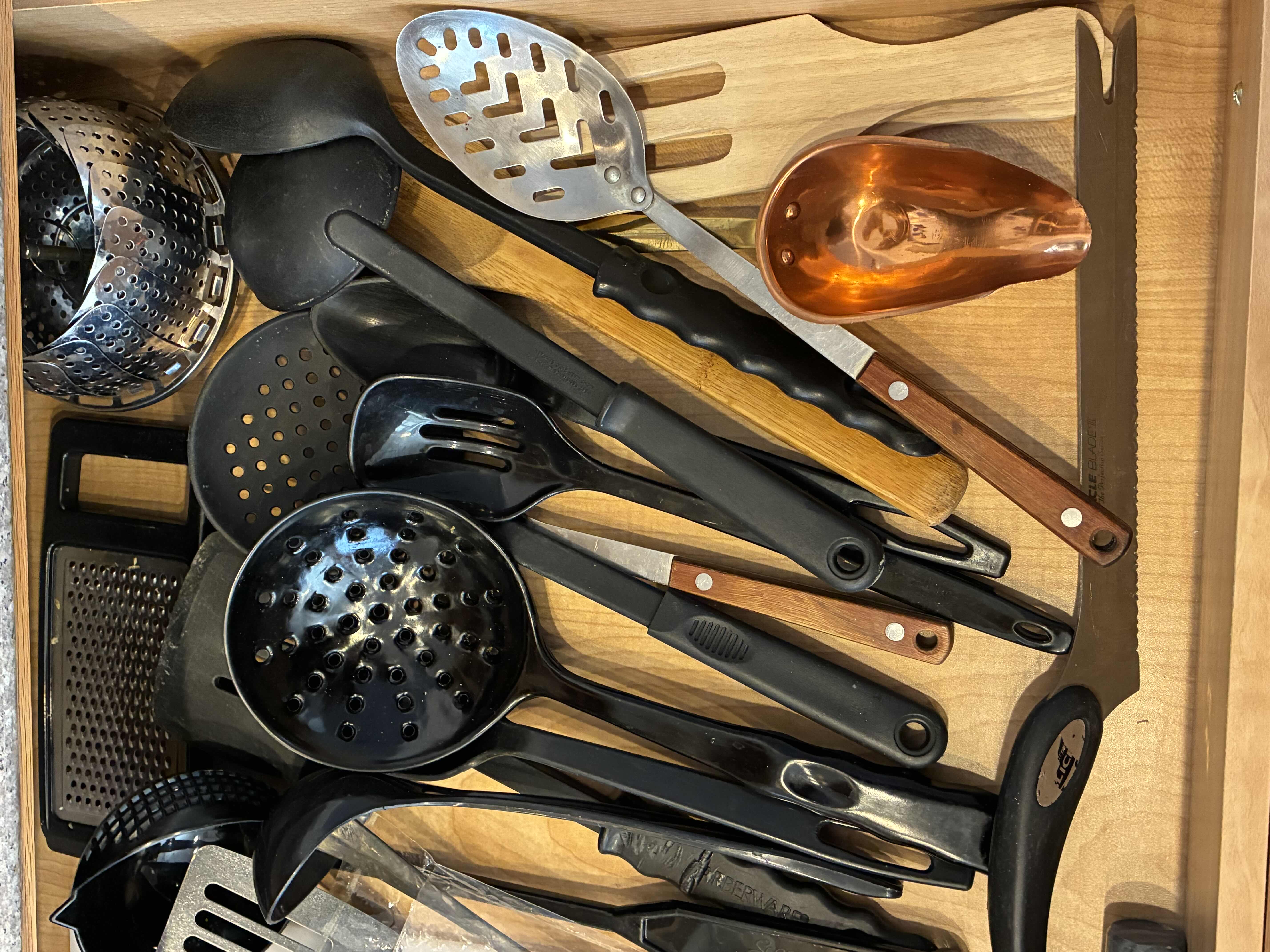 Photo 1 of CONTENTS OF DRAWER -KITCHEN UTENSILS & CUTLERY W CUTTING BOARD