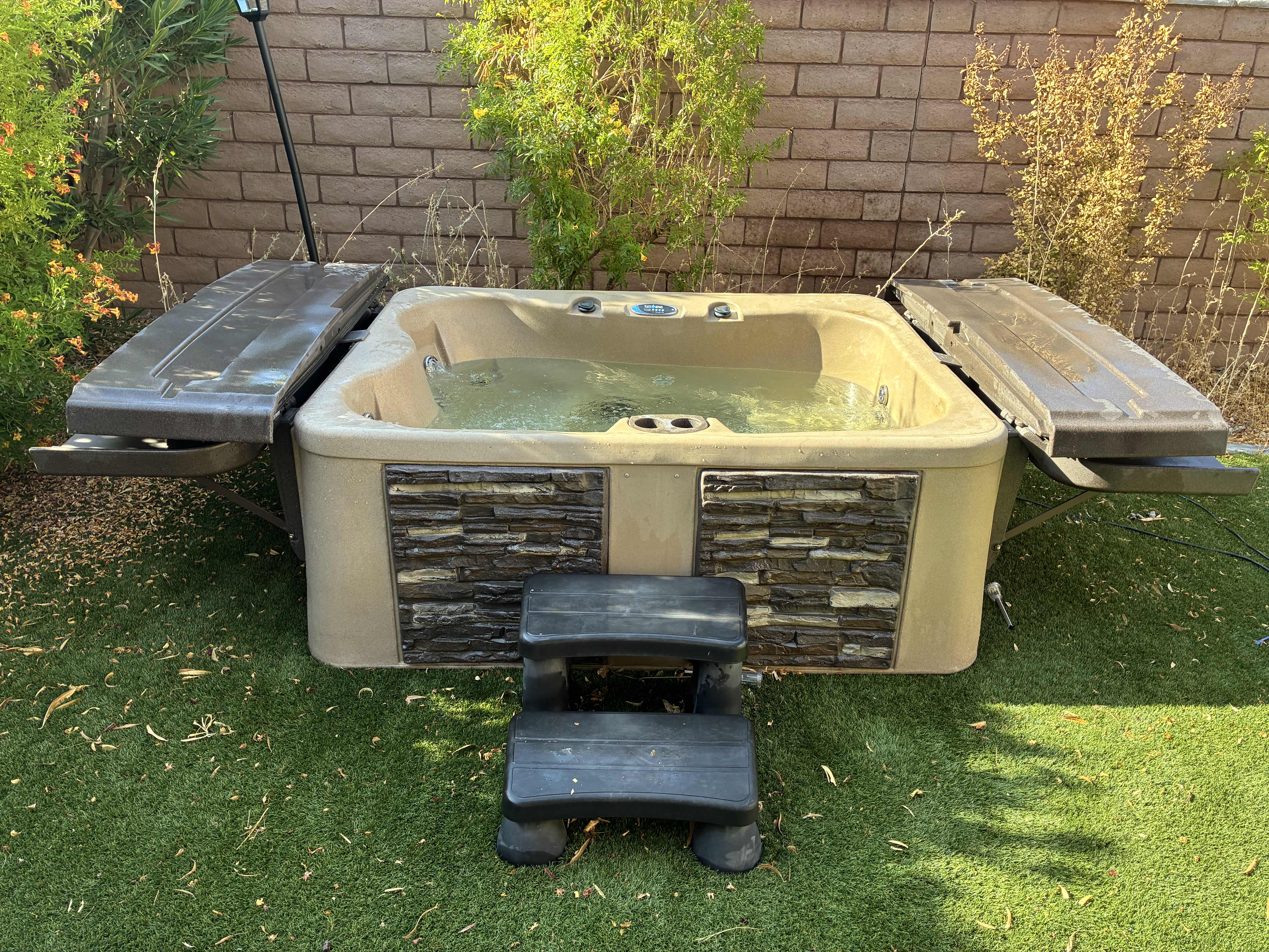 Photo 1 of TUFF SPAS MOCHA/TAUPE SPLITFACE PANELED ABOVE GROUND ELECTRIC HOT TUB $5599