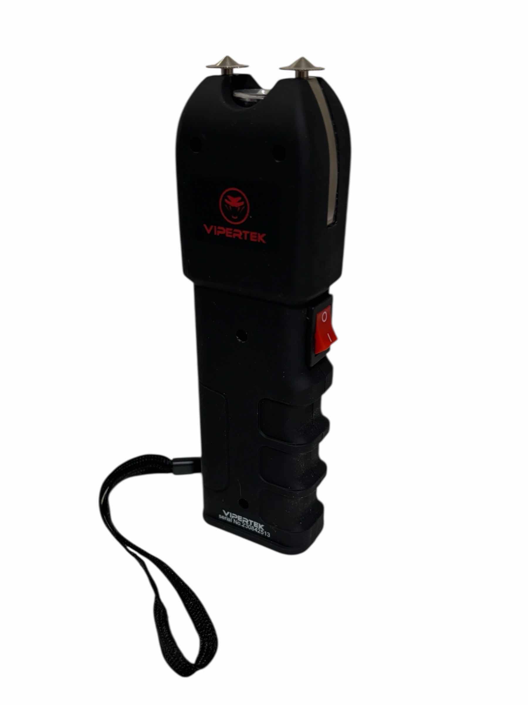 Photo 1 of VIPERTEK HEAVY DUTY RECHARGEABLE STUN GUN/ LED FLASHLIGHT W CHARGER,  BLACK VTS-989   $26