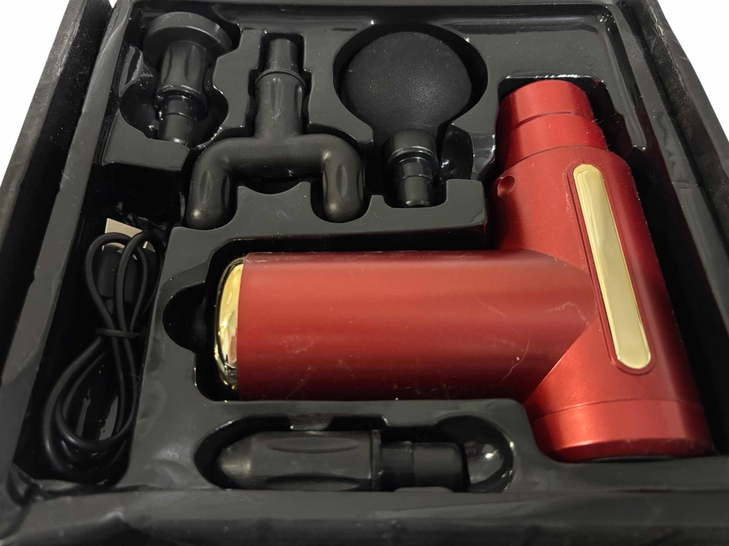 Photo 1 of DEEP TISSUE MASSAGE GUN W 4 MASSAGE HEAD ATTACHMENTS & CHARGER CORD, RED/GOLD  $40