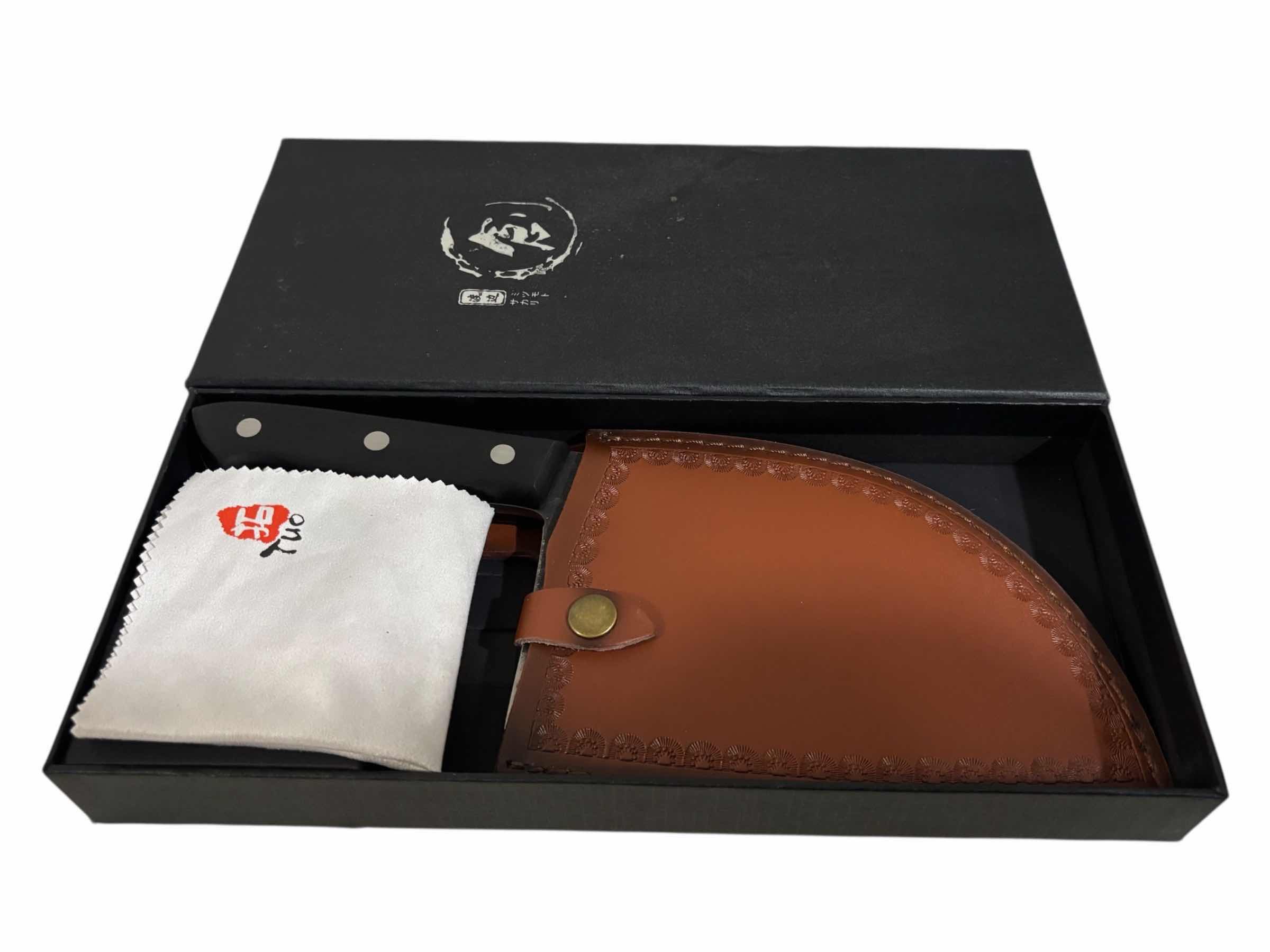 Photo 1 of PROFESSIONAL CHEF 12” CLEAVER/CHOPPER KNIFE W LEATHER SHEATH, CLEANING TOWEL & BOX $55