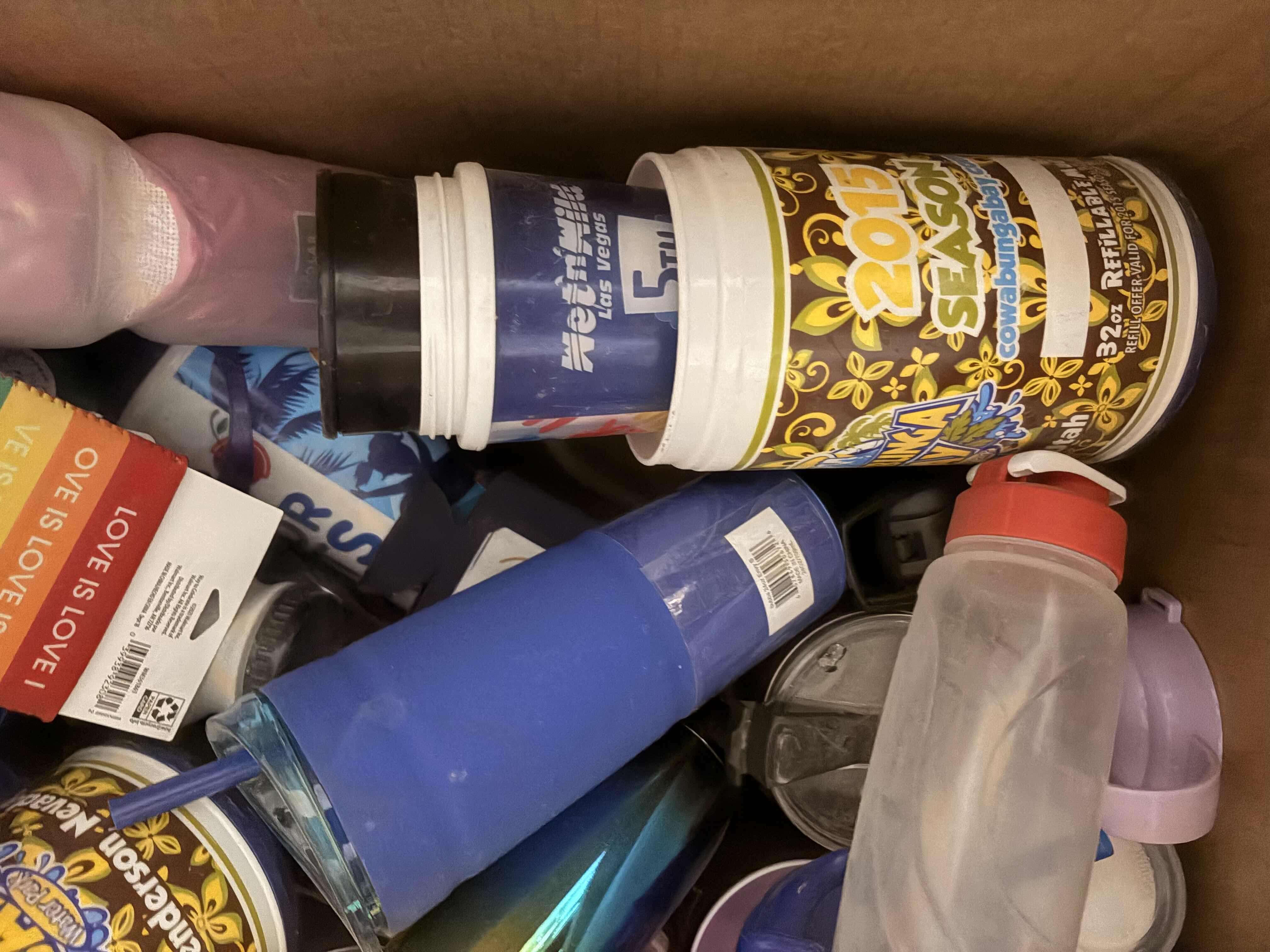 Photo 1 of BOX OF ASSORTED PLASTIC WATER BOTTLES
