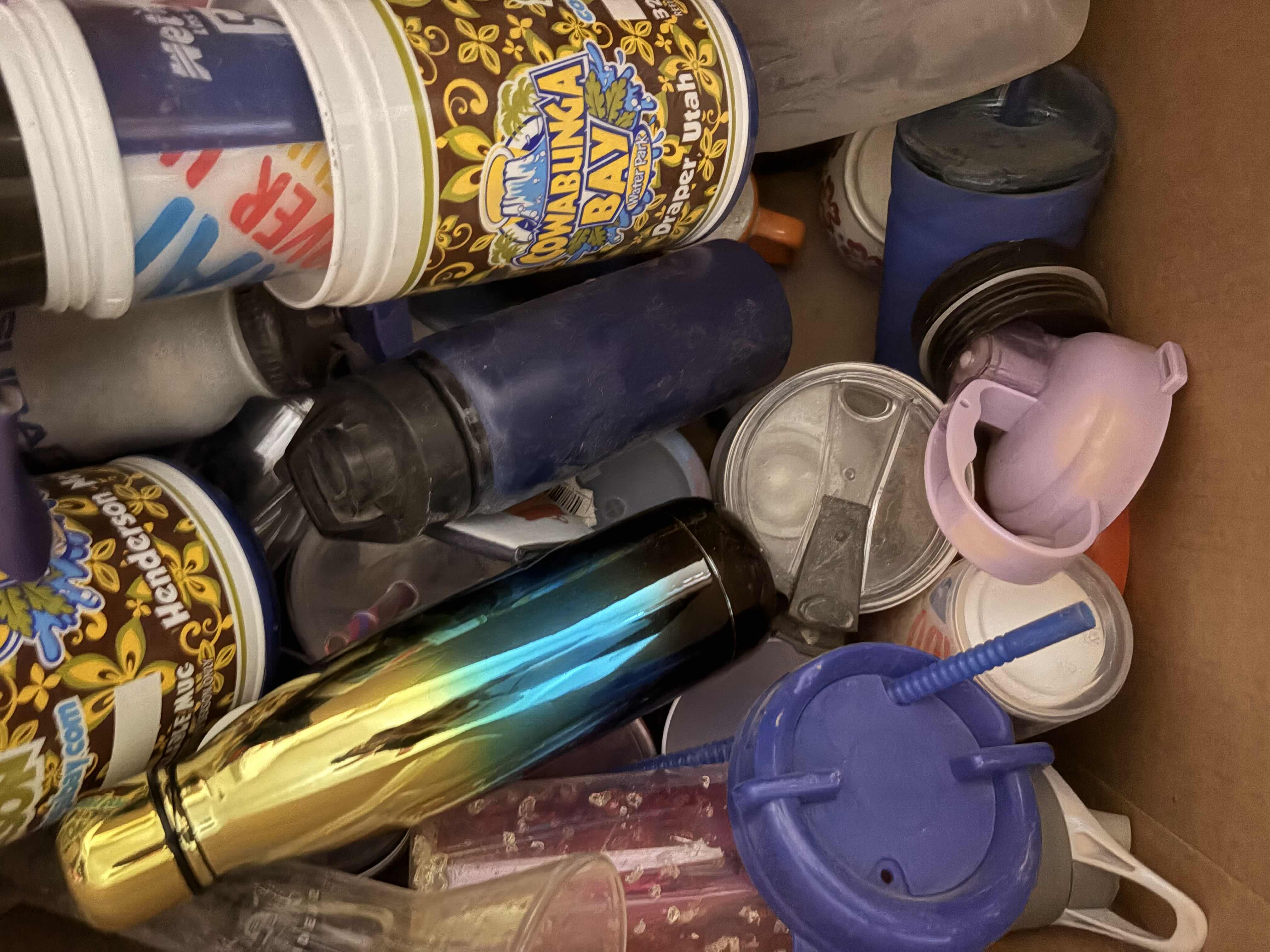 Photo 1 of BOX OF ASSORTED PLASTIC WATER BOTTLES