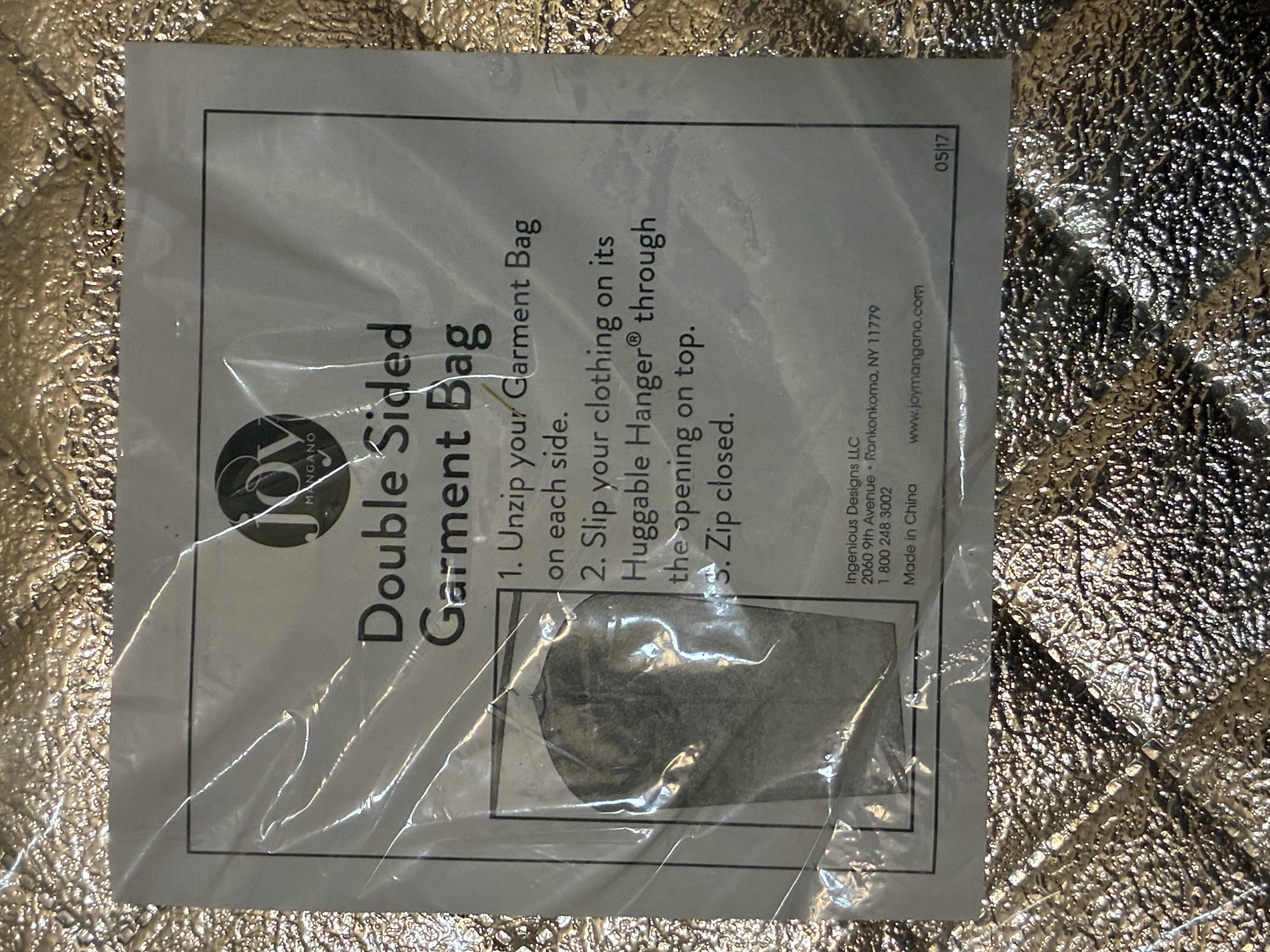 Photo 1 of JOY MANGANO SILVER DOUBLE-SIDED GARMIN BAG