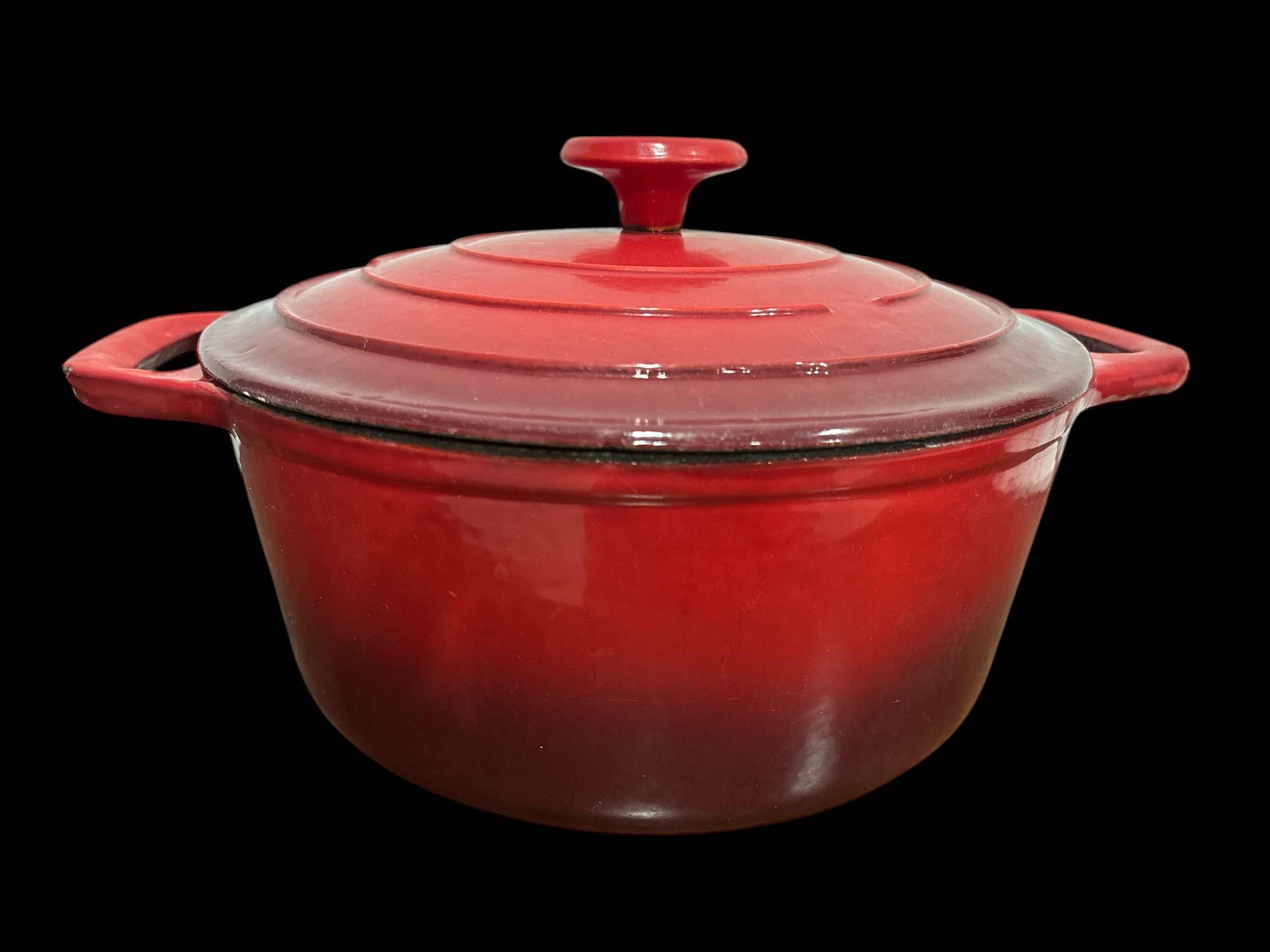 Photo 1 of COOKS COMPANION ROUND 5 QT ENAMELED CAST-IRON DUTCH OVEN, RED OMBRÉ