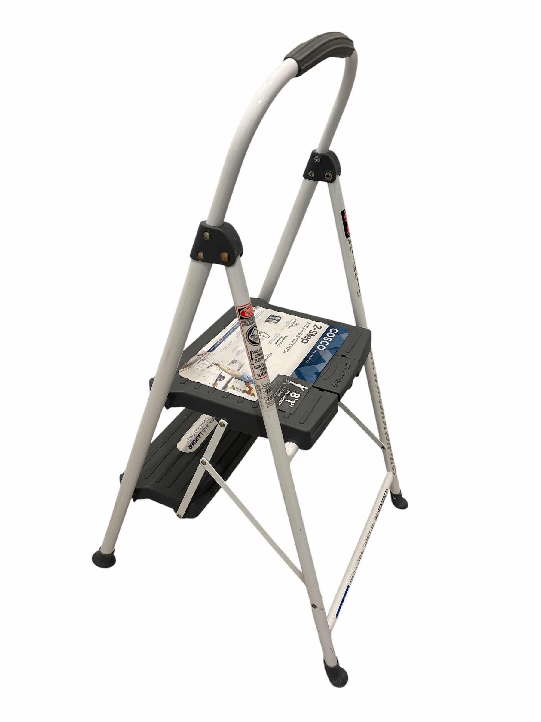 Photo 1 of COSCO 2-STEP FOLDING STEP STOOL    $40