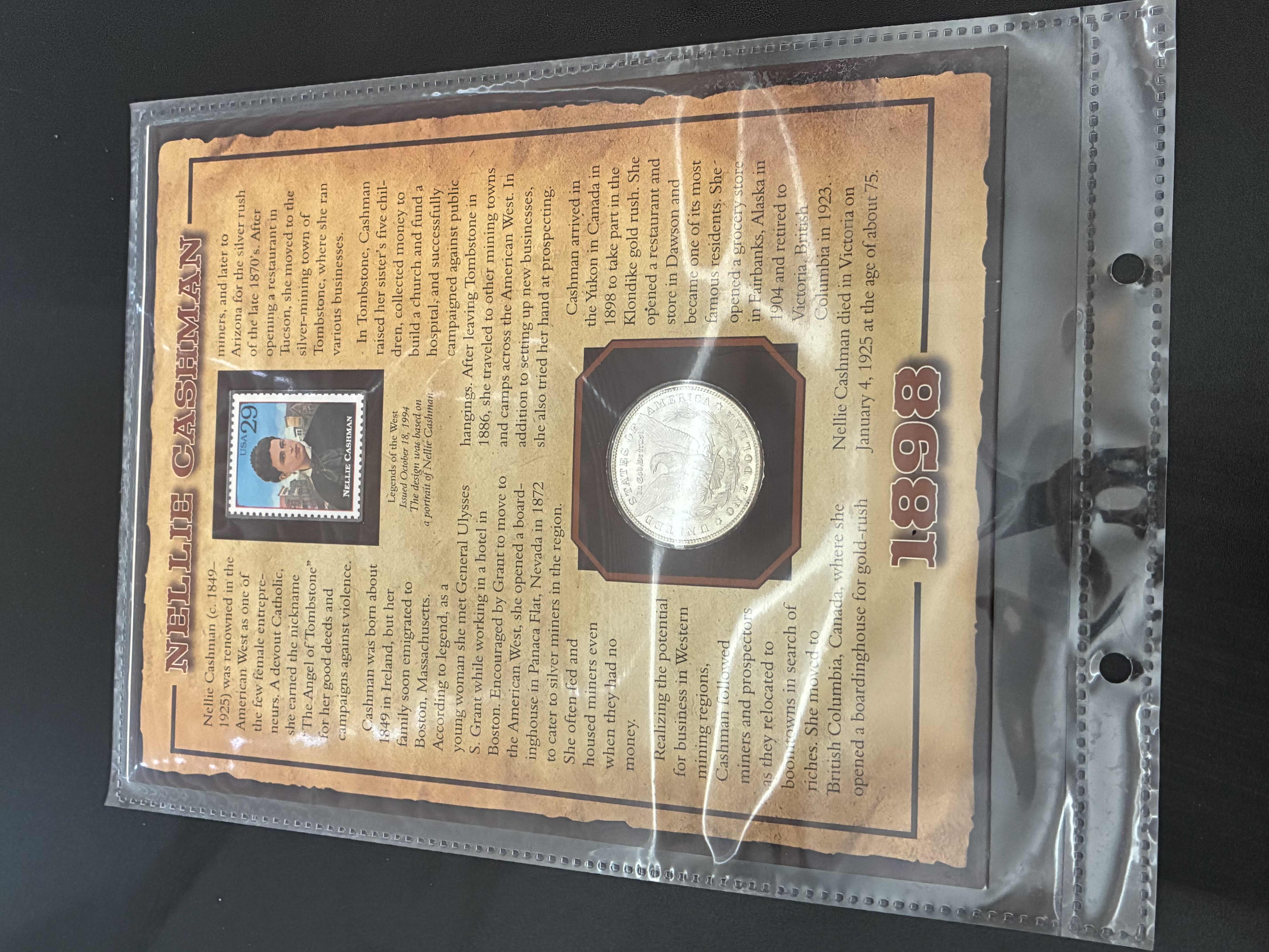 Photo 1 of UNCIRCULATED CONDITION 1898 MORGAN SILVER DOLLAR W NELLIE CASHMAN CARD & SLEEVE $300