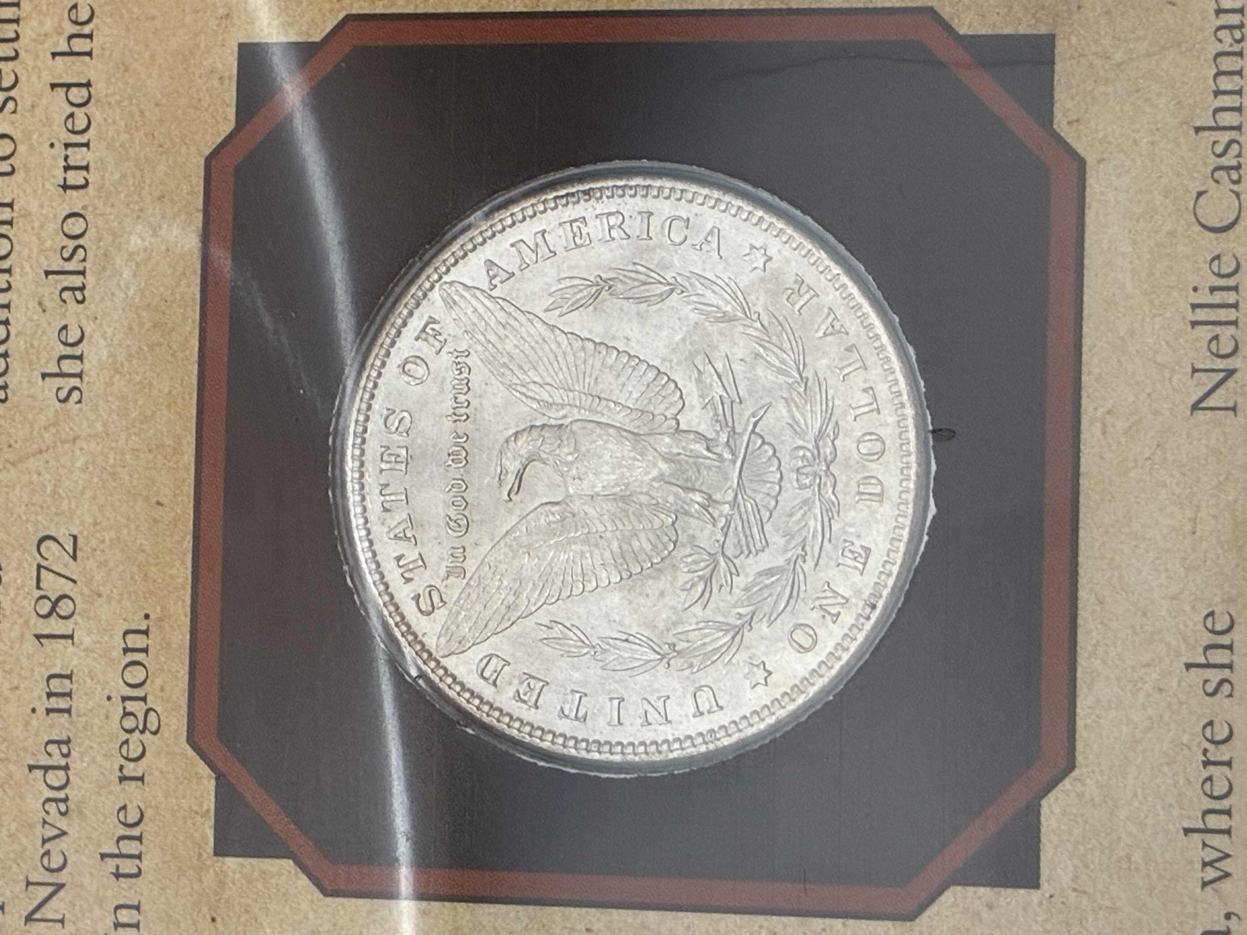 Photo 1 of UNCIRCULATED CONDITION 1898 MORGAN SILVER DOLLAR W NELLIE CASHMAN CARD & SLEEVE $300