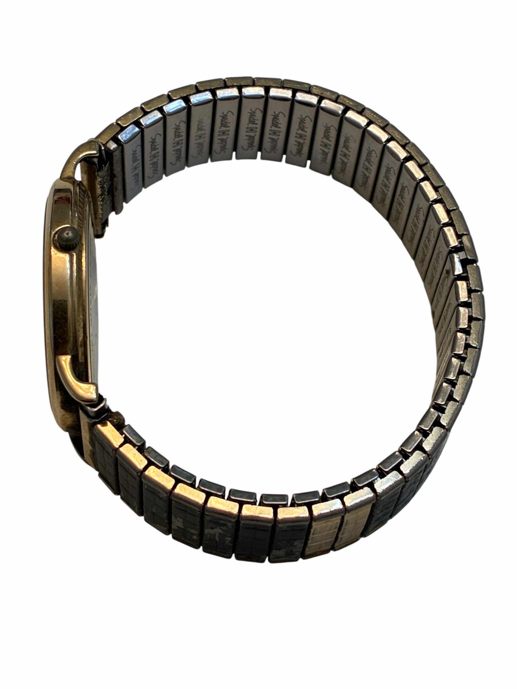 Photo 1 of TIFFANY & CO PORTFOLIO SWISS MADE 14K GOLD FLEX BAND WATCH