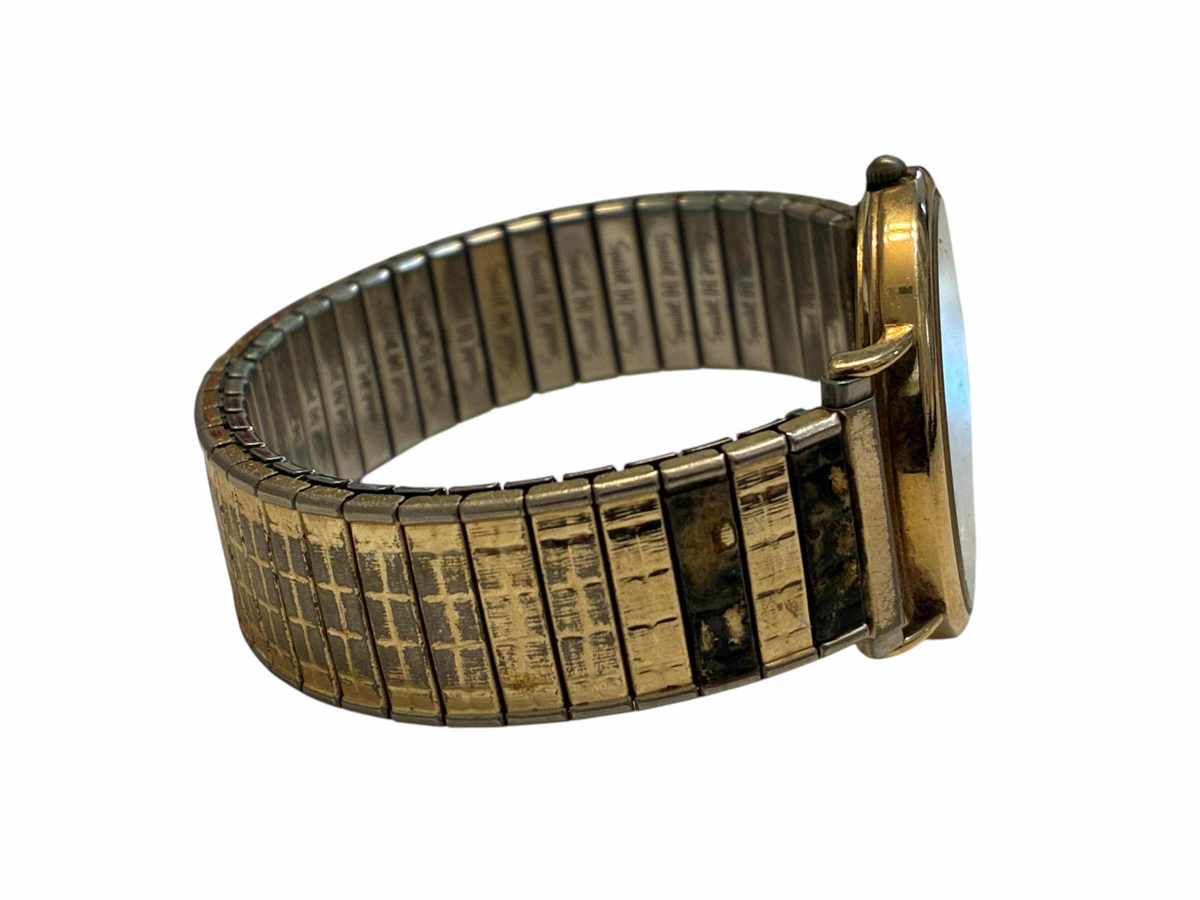 Photo 1 of TIFFANY & CO PORTFOLIO SWISS MADE 14K GOLD FLEX BAND WATCH
