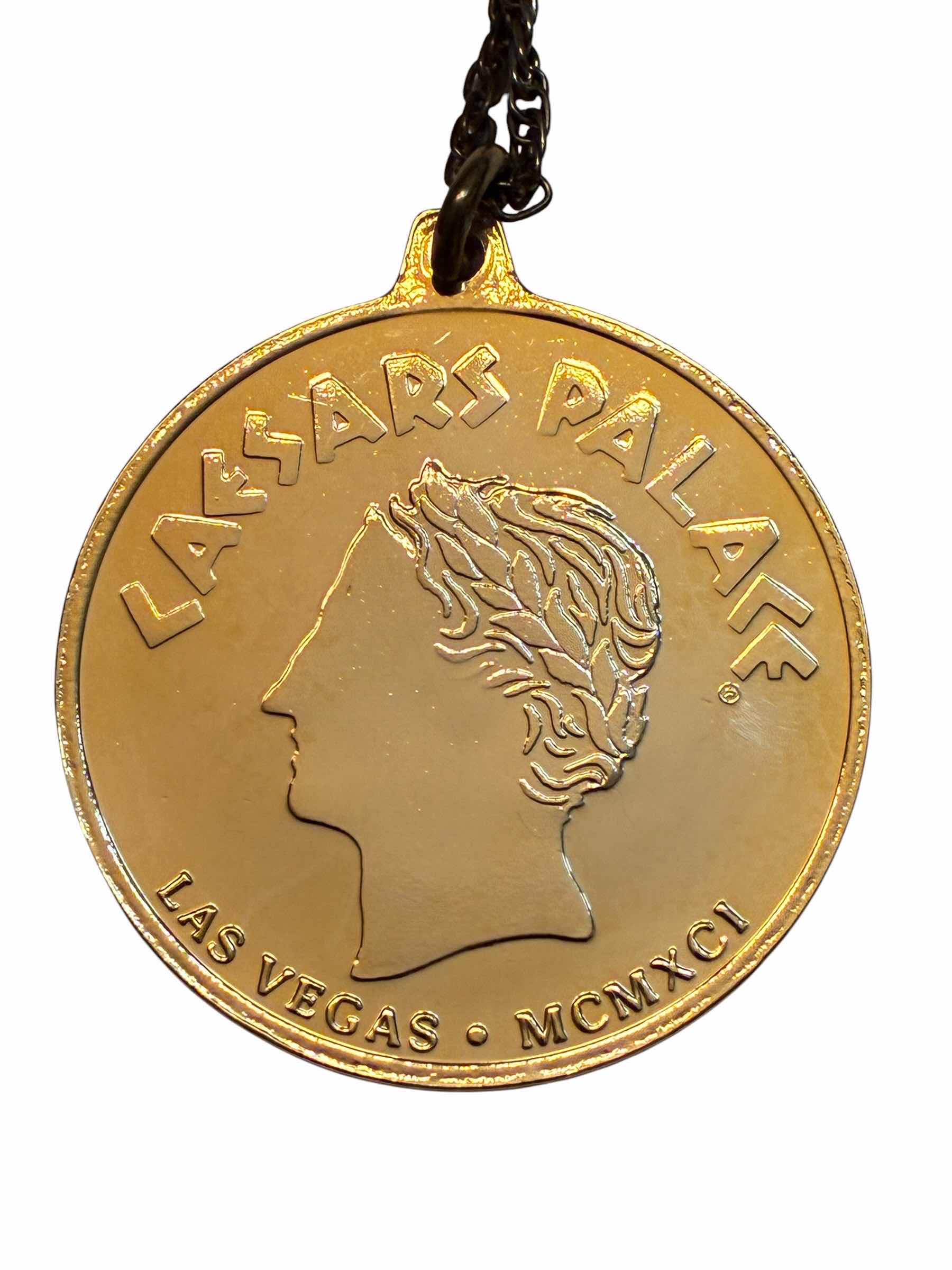 Photo 1 of CAESARS PALACE LAS VEGAS/MCMXCI 2” GOLD TONE MEDALLION NECKLACE