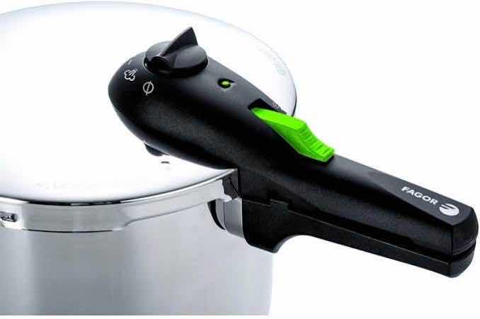 Photo 1 of FAGOR RAPID EXPRESS 8 QT STAINLESS STEEL PRESSURE COOKER W STEAMER, 918013366