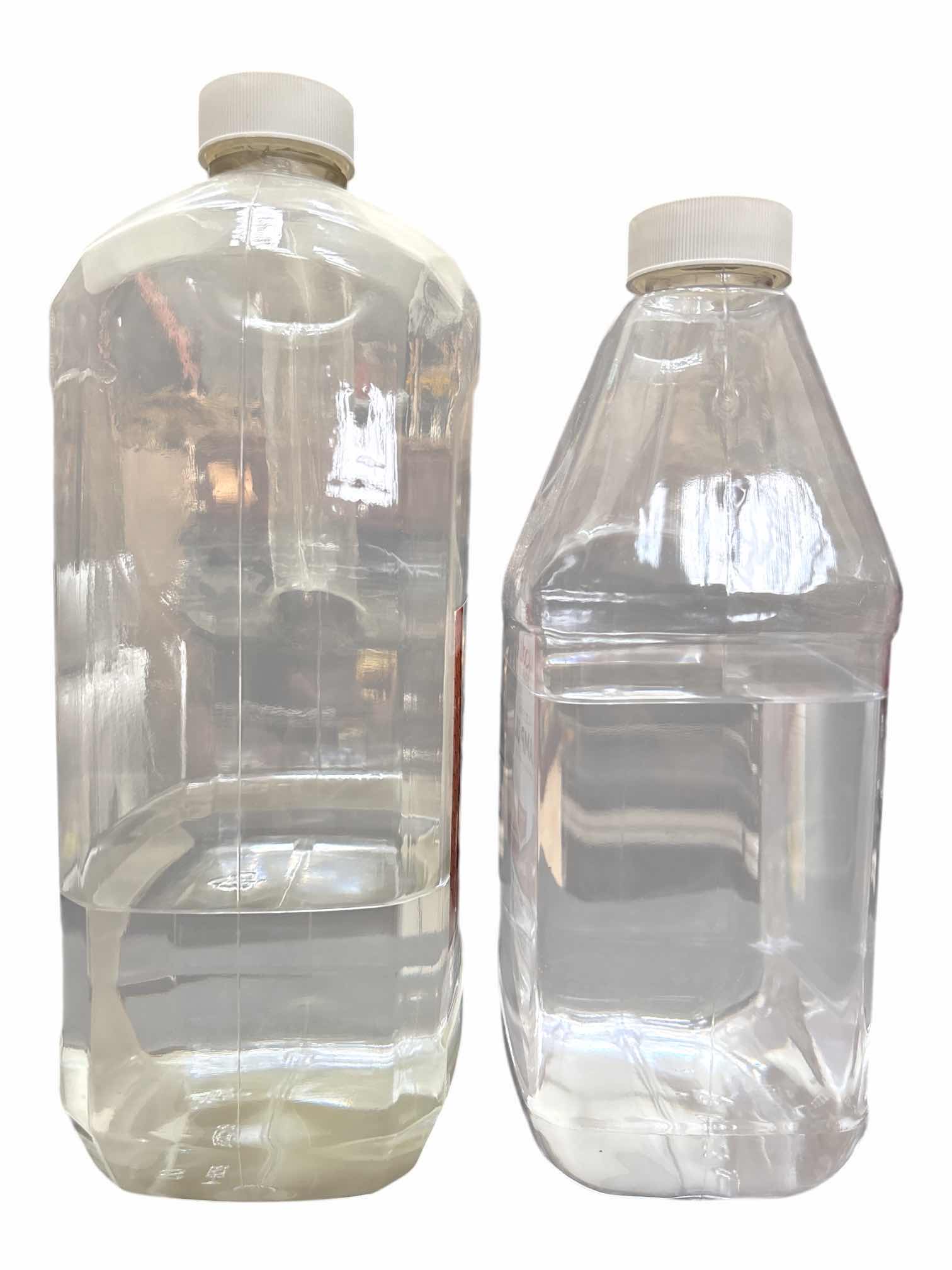 Photo 1 of PARAFFIN LAMP OIL INDOOR/OUTDOOR, ODORLESS/SMOKELESS (2 PARTIAL GALLONS)