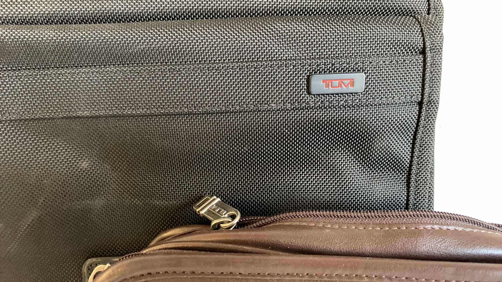 Photo 1 of 2 TUMI BAGS