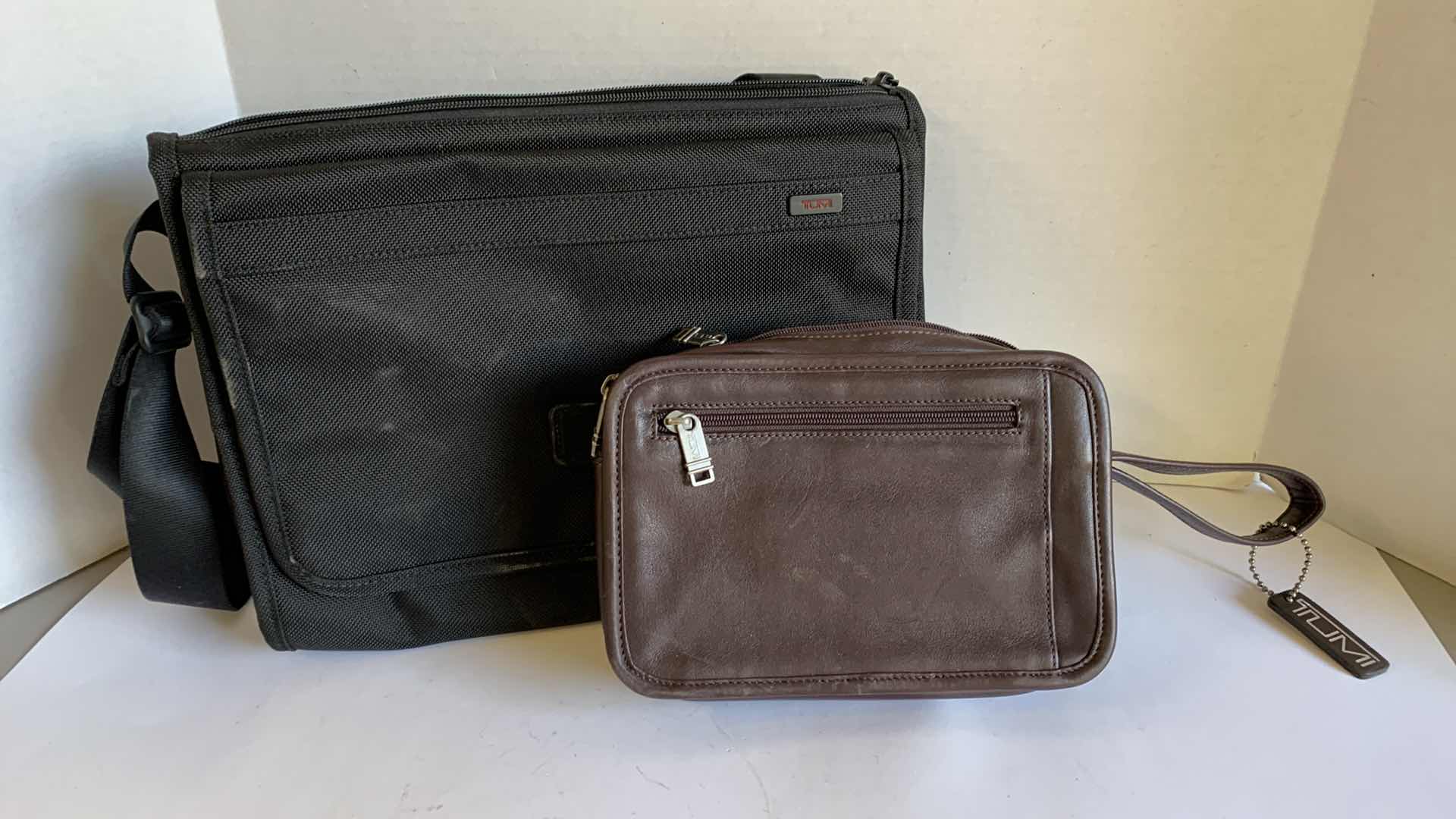 Photo 1 of 2 TUMI BAGS