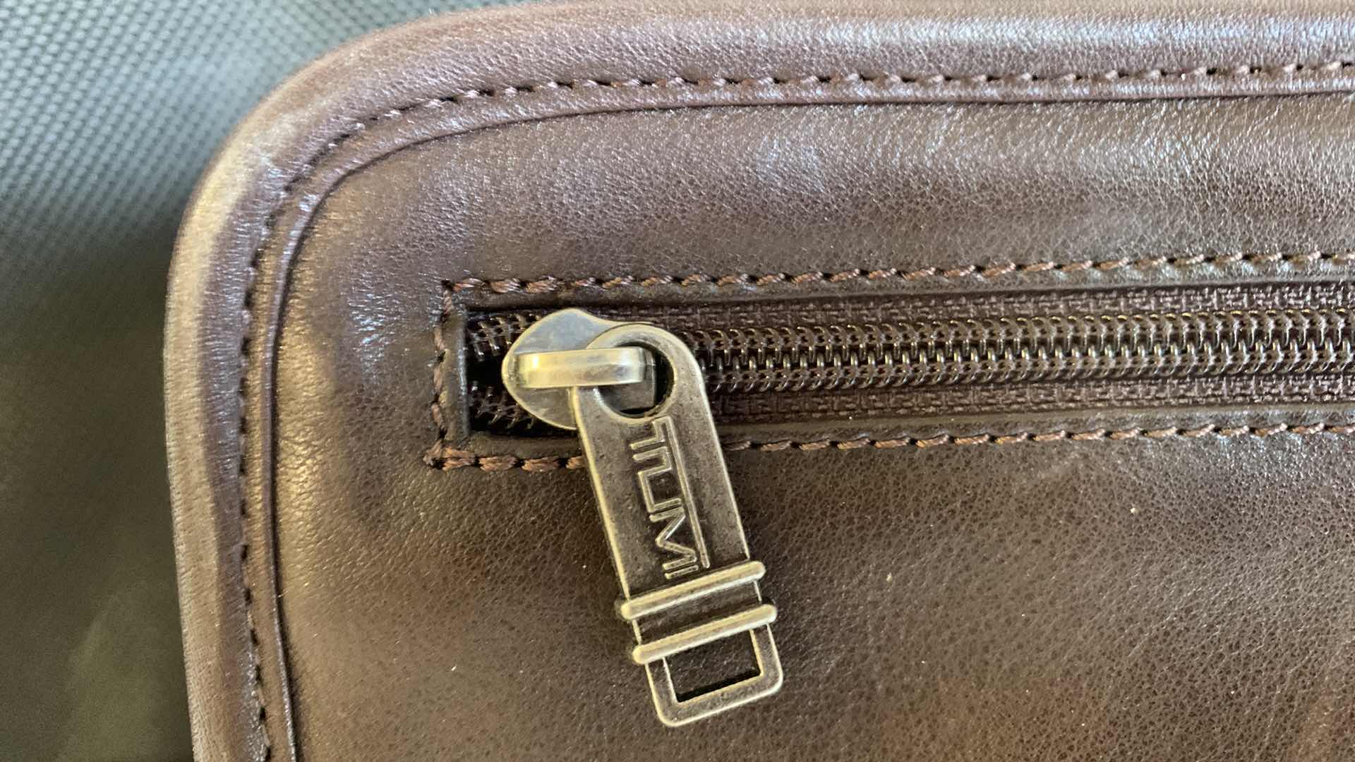 Photo 1 of 2 TUMI BAGS