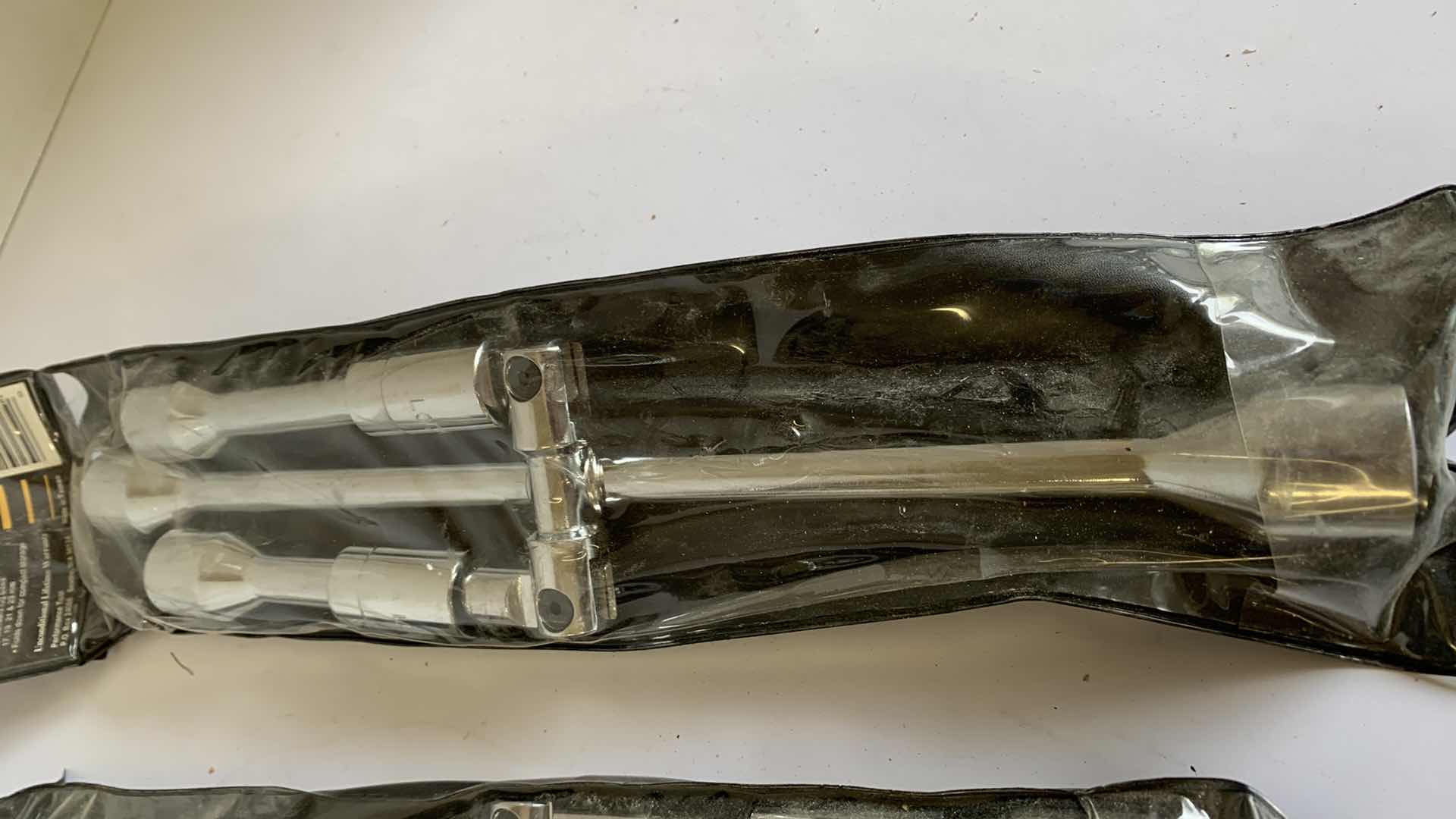 Photo 1 of 2 PERFORMANCE TOOL FOLDING SAE AND METRIC LUG WRENCHES