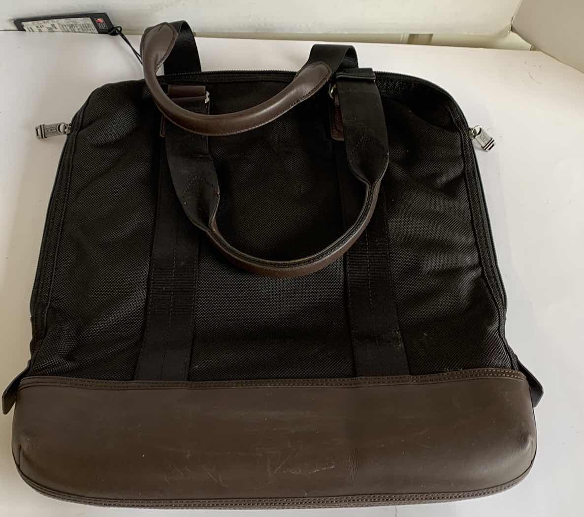 Photo 1 of *INCOMPLETE, SEE NOTES** TUMI BRONCO TOP ZIP CROSSBODY BAG