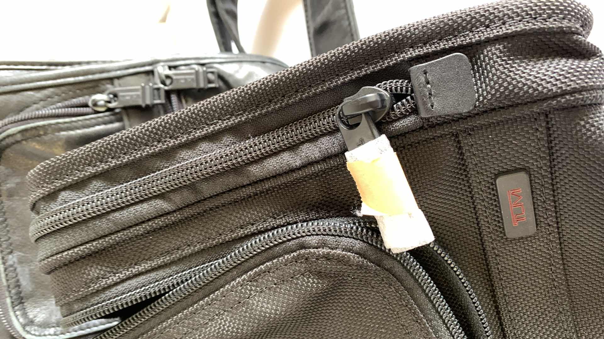 Photo 1 of 3 TUMI SMALL BAGS