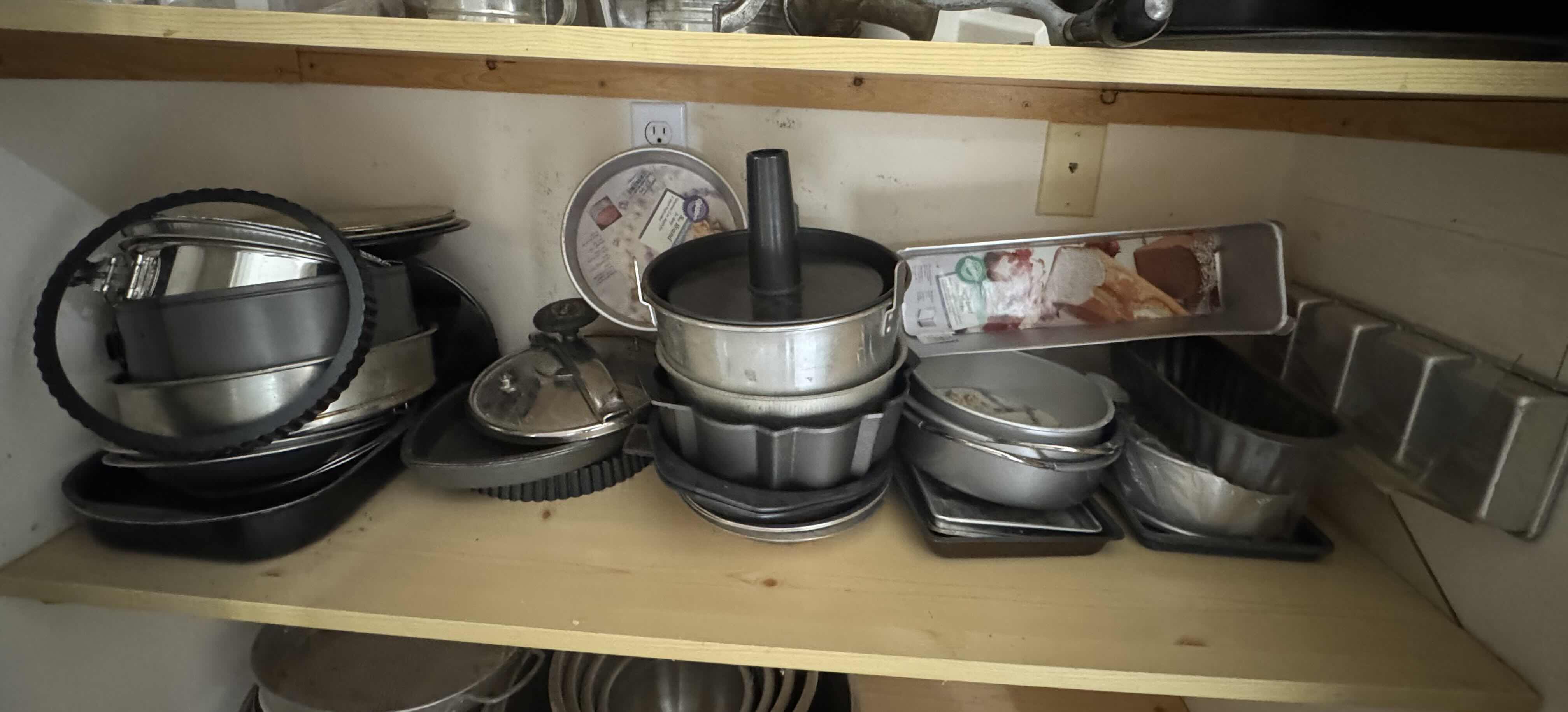 Photo 1 of CONTENTS OF SHELF (BAKEWARE AND MOLDS)