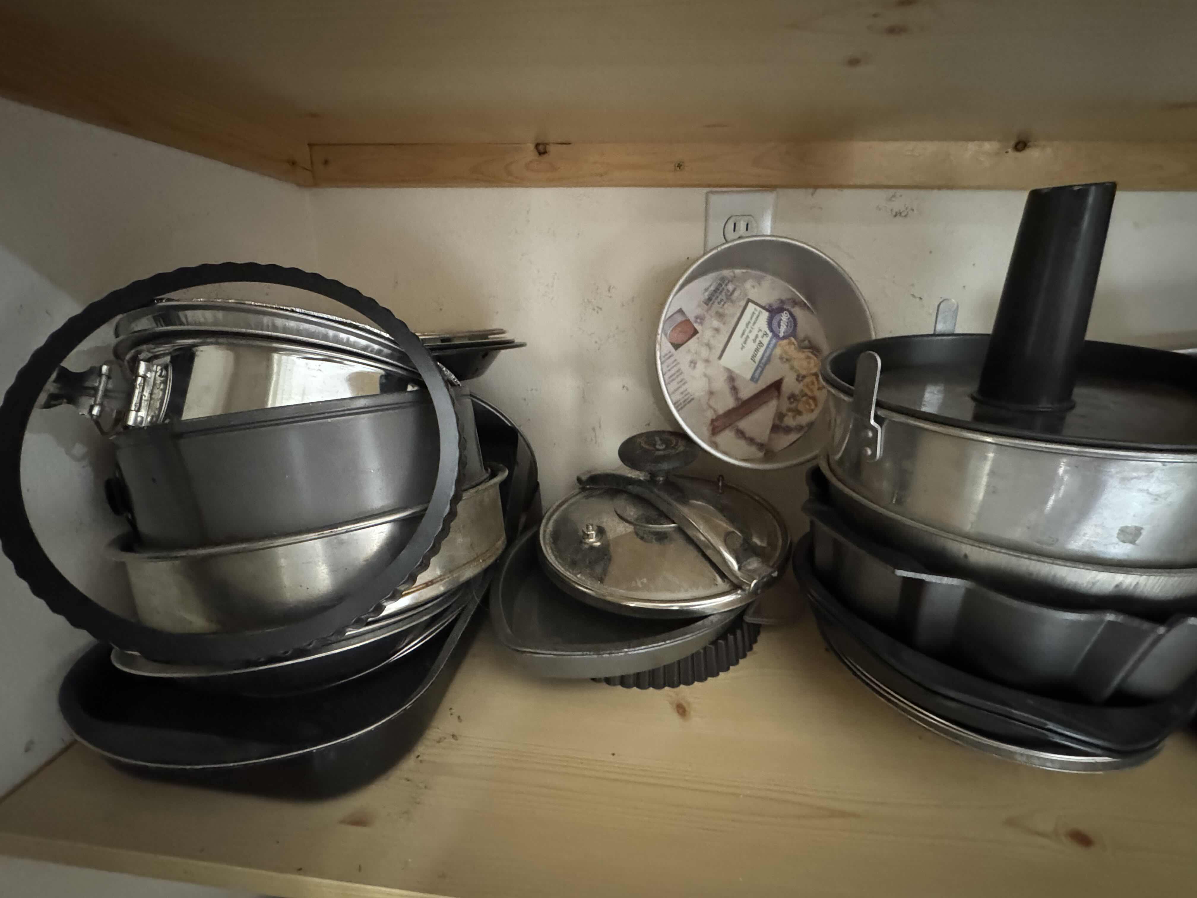 Photo 1 of CONTENTS OF SHELF (BAKEWARE AND MOLDS)