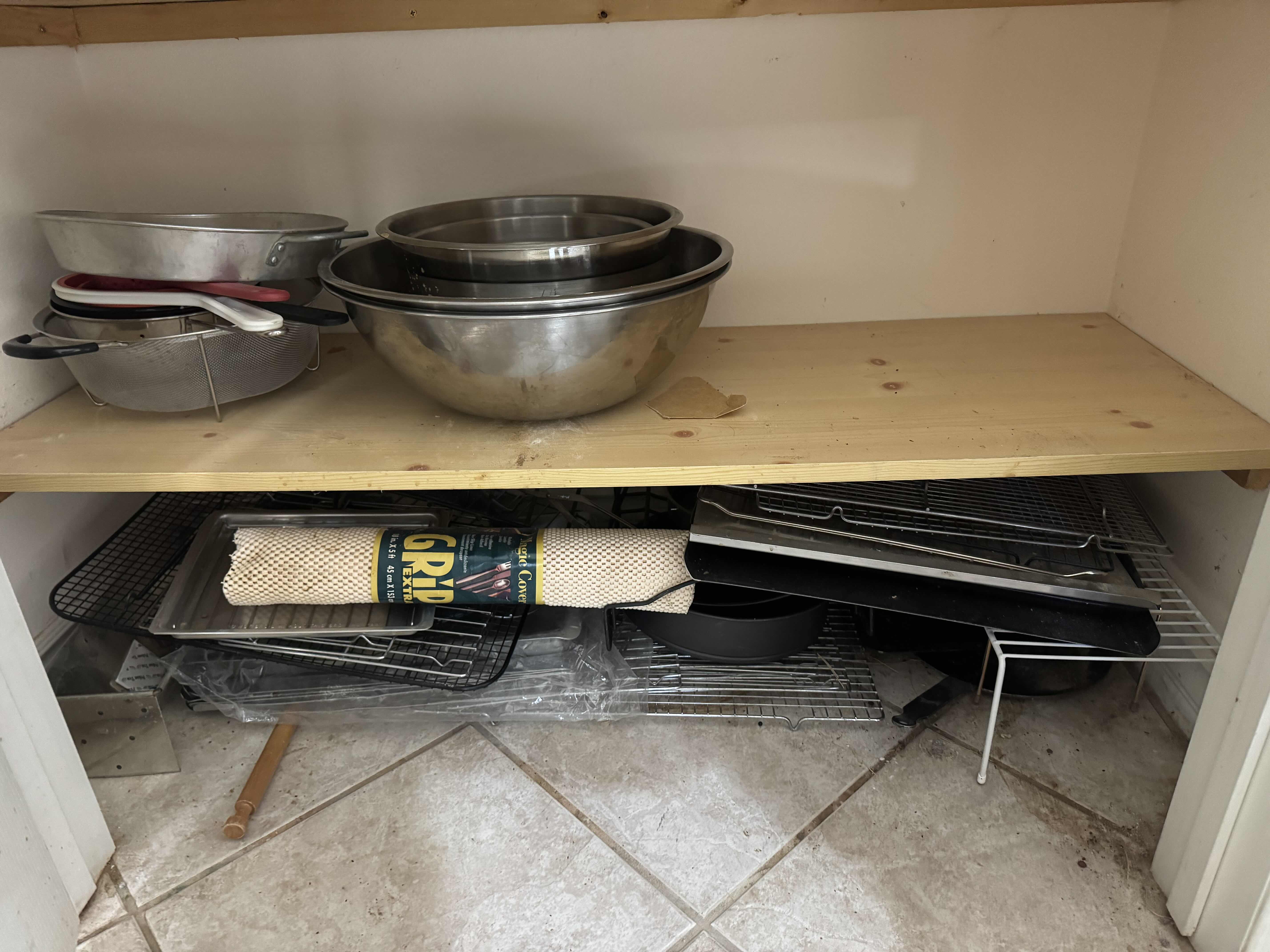 Photo 1 of CONTENTS OF 2 SHELVES- MIXING BOWLS, WIRE RACKS, COOKIE SHEET)